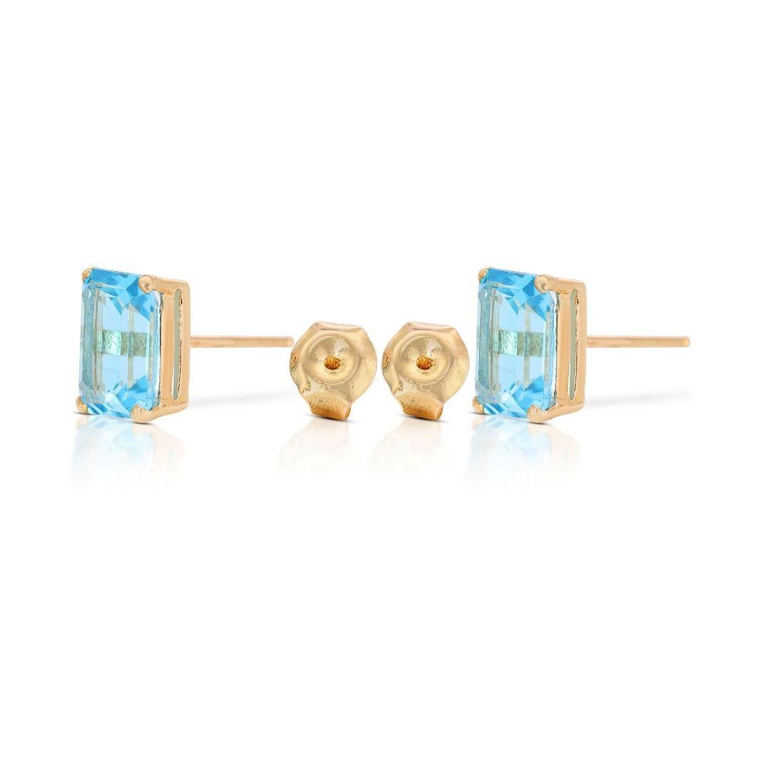Chic 14K Yellow Gold Blue Topaz Stud Earrings For Sale 1