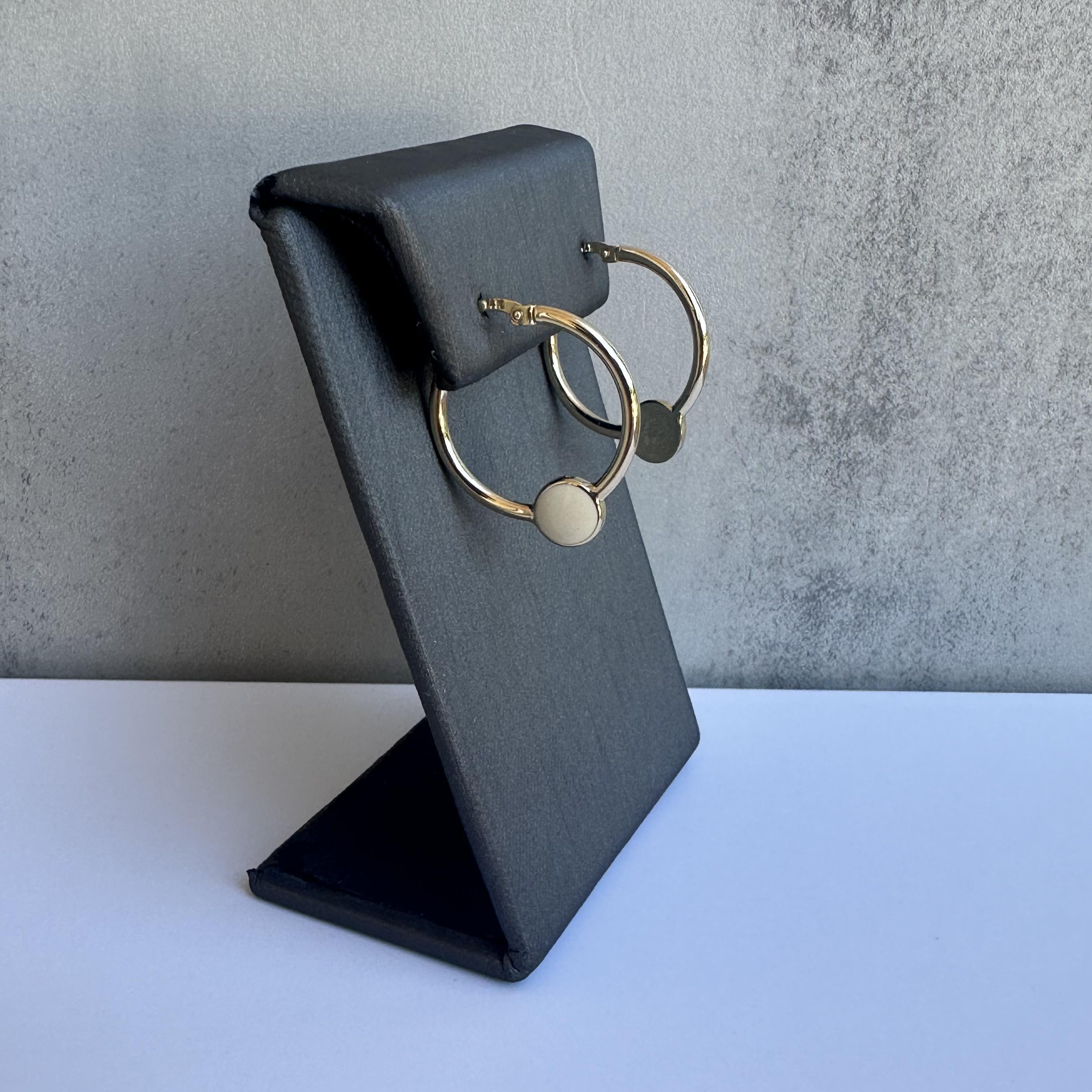 Add a touch of chic sophistication to your jewelry collection with these elegant 14kt Yellow Gold Enamel Hoop Earrings. Featuring a stylish enamel design, these hoops combine classic elegance with a modern twist, perfect for any