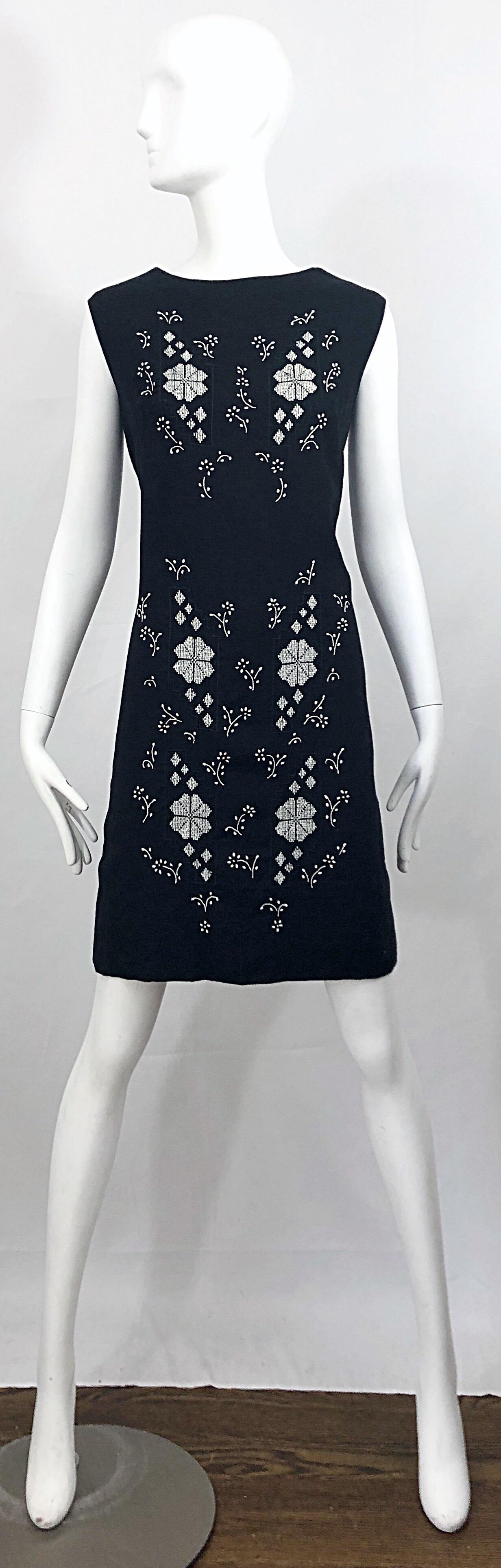 Chic vintage 60s Puerto Rican black and white embroidered linen shift dress! Features a luxurious erinore Irish linen, which is listed on the label as crease resisting Irish linen. So, this is a great dress to pack! Tailored silhouette with a