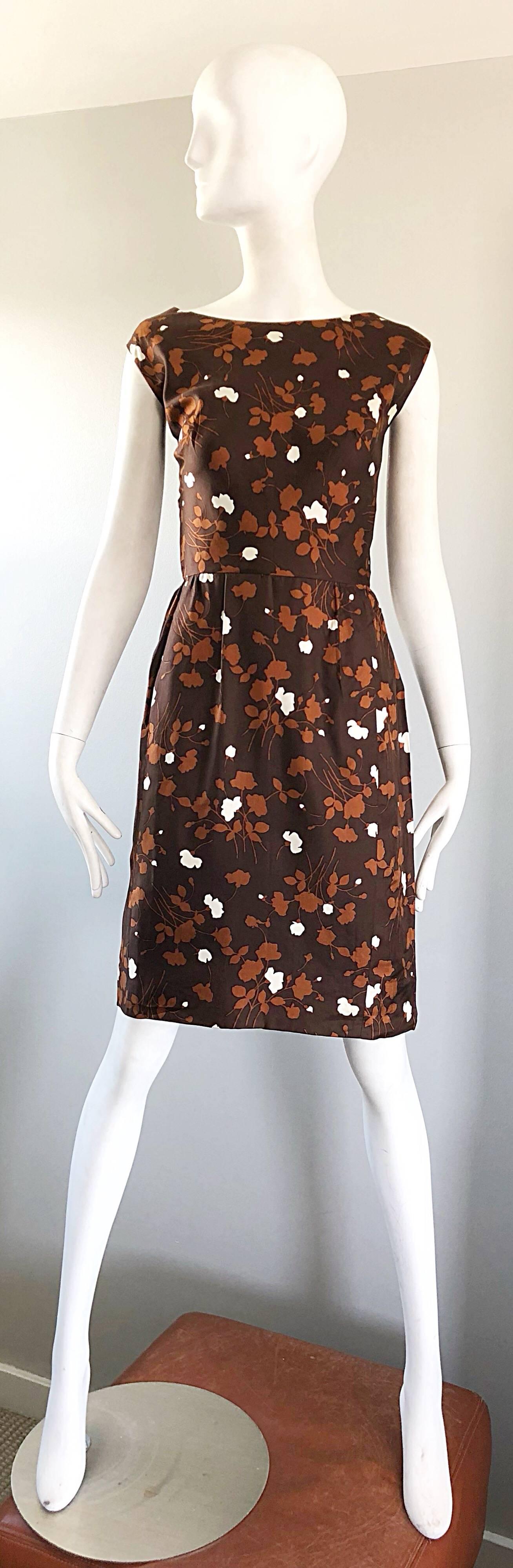 Chic 1960s brown, rust and white silk autumnal dress and jacket ensemble! Dress features a fitted bodice with a forgiving skirt. Full metal zipper up the back with button closure. POCKETS at both sides of the hips. Jacket is a faux double breasted