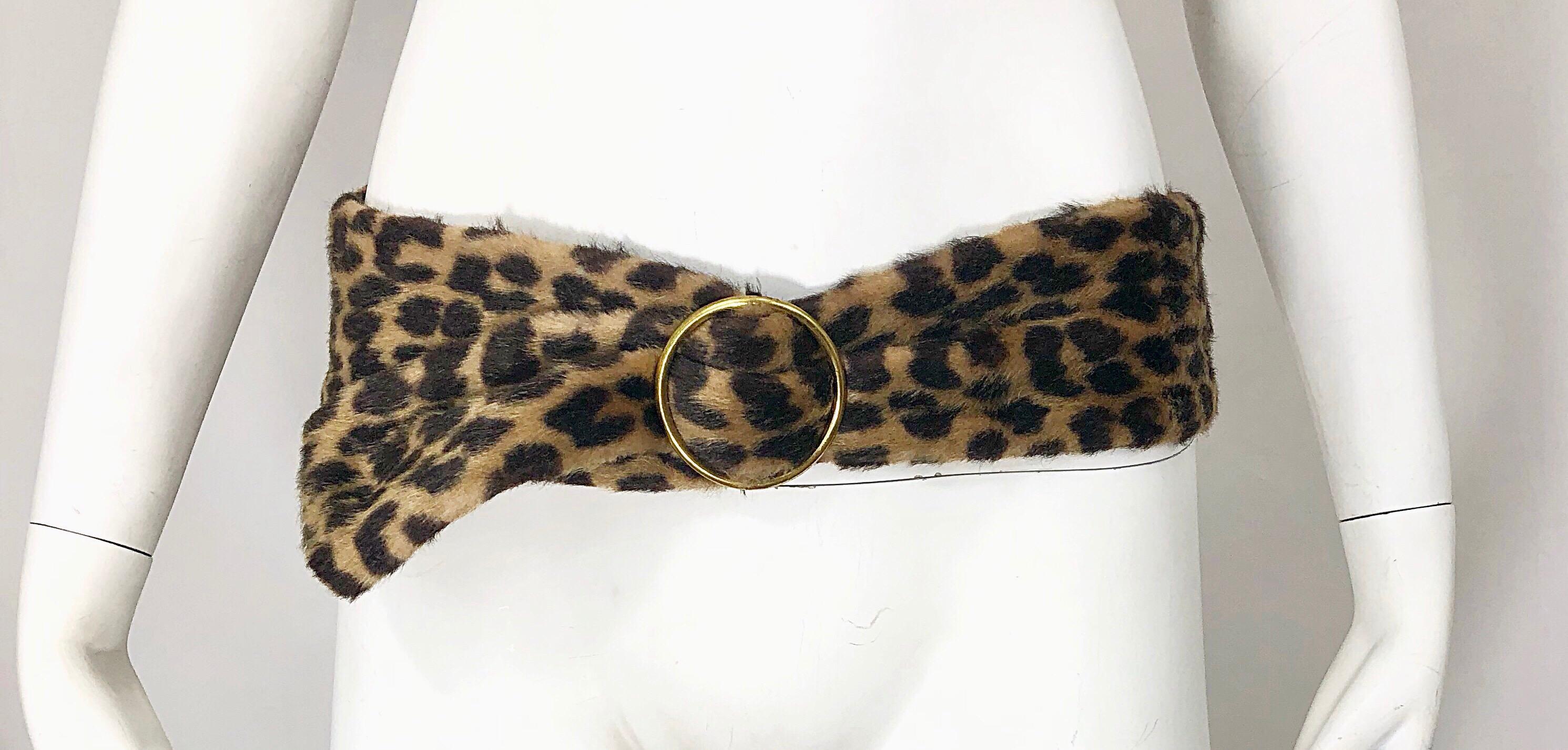 Chic mid 60s DAME NEW YORK leopard / cheetah print faux fur belt! Features soft faux fur with the classic animal print throughout. Gold loop buckle belt allows this to be worn by a vast array of sizes. Great with jeans, shorts, a skirt, trousers, or