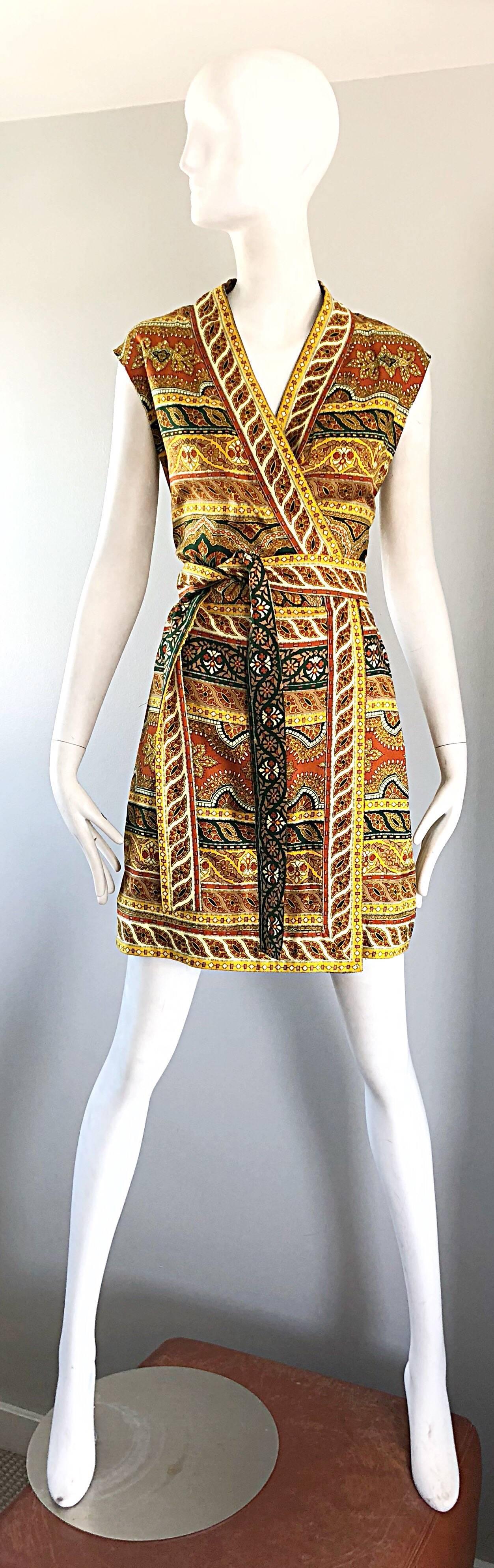 Chic 1960s DONALD BROOKS batik ethnic silk sleeveless wrap boho dress and sash belt! I love the quality and construction of Donald Brooks pieces. He was one of my favorite designers of the 60s and 70s. This rare gem features vibrant warm hues of