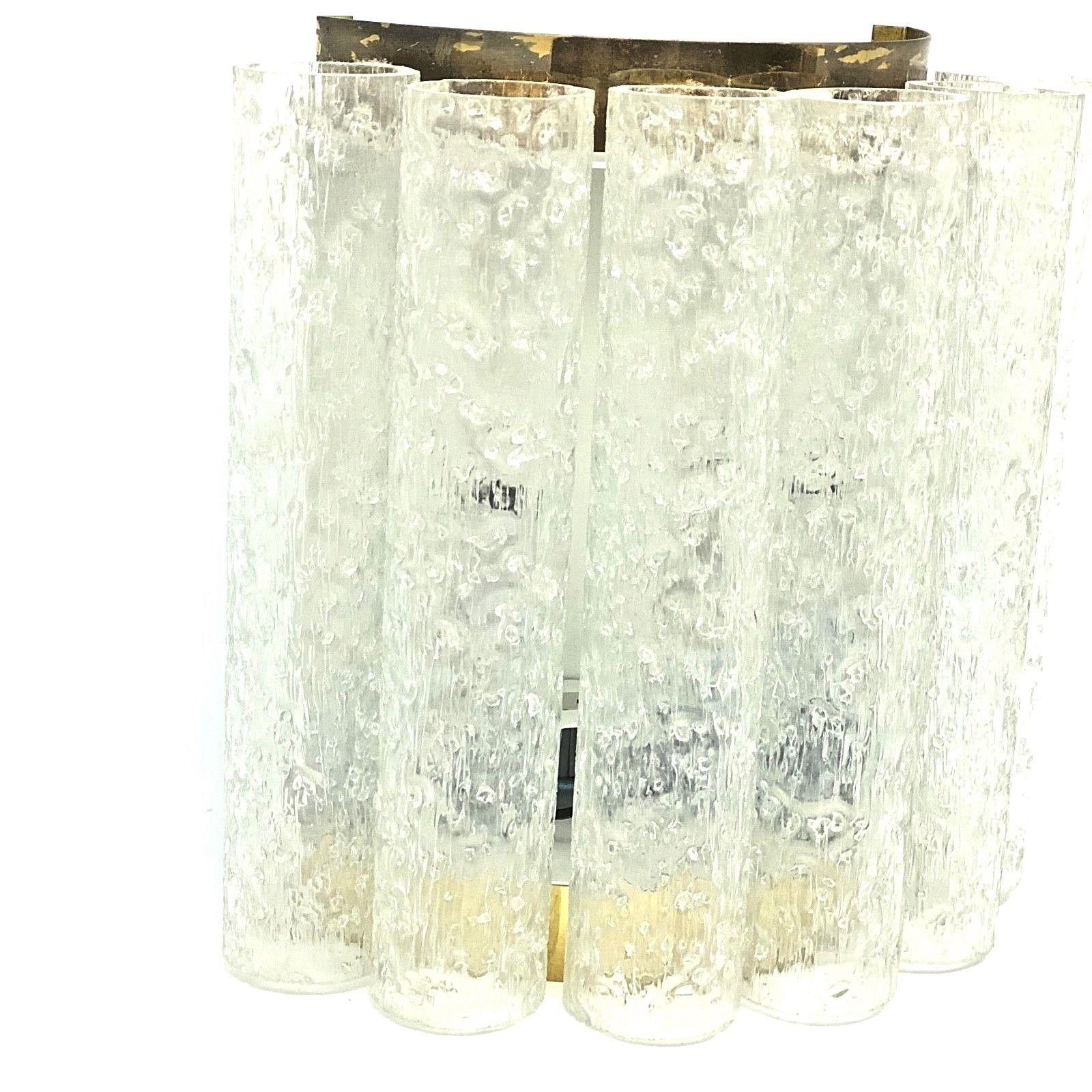 Elegant chic glass tube sconce by Doria Leuchten, Germany. The Fixture requires two European E14 candelabra bulbs, each bulb up to 40 watts. Brass parts with patina, but this is old-age.