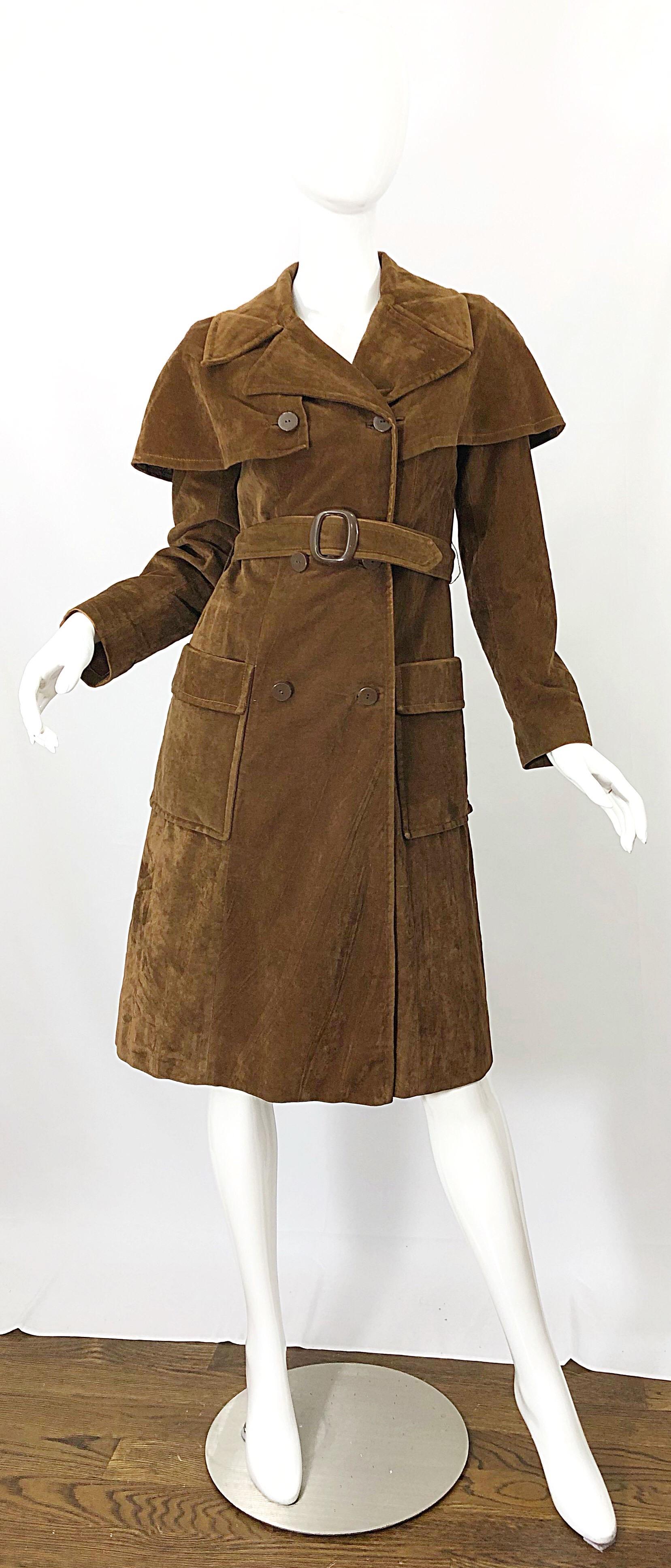 Chic 60s HARZFELD'S of Kansas City brown velvet double breasted aviator style trench jacket! Features an attached capelet. Detachable belt. Pockets at each side of the hips. Fully lined. This coat is especially special to me because it belonged to