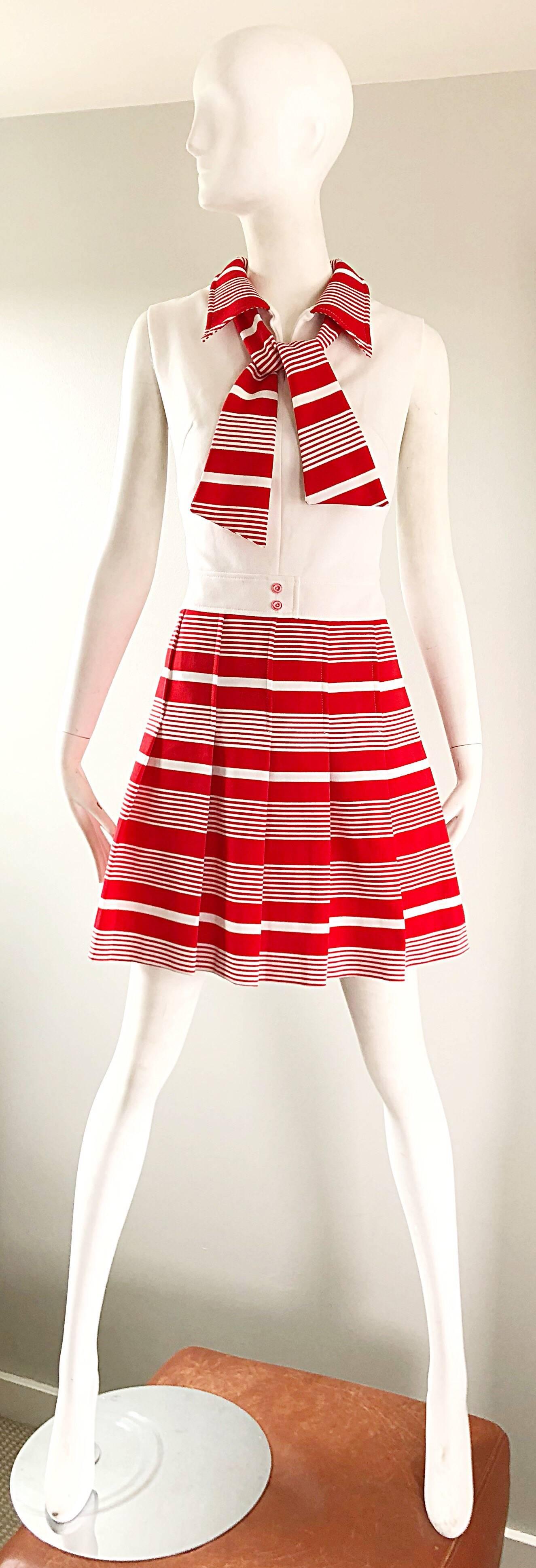 Chic 60s Italian red and white striped knit A-Line scooter dress! Features a fitted white bodice with an attached sash scarf at the neck. Flattering pleated skirt. Soft knit fabric stretches to fit. Full metal zipper up the back with hook-and-eye