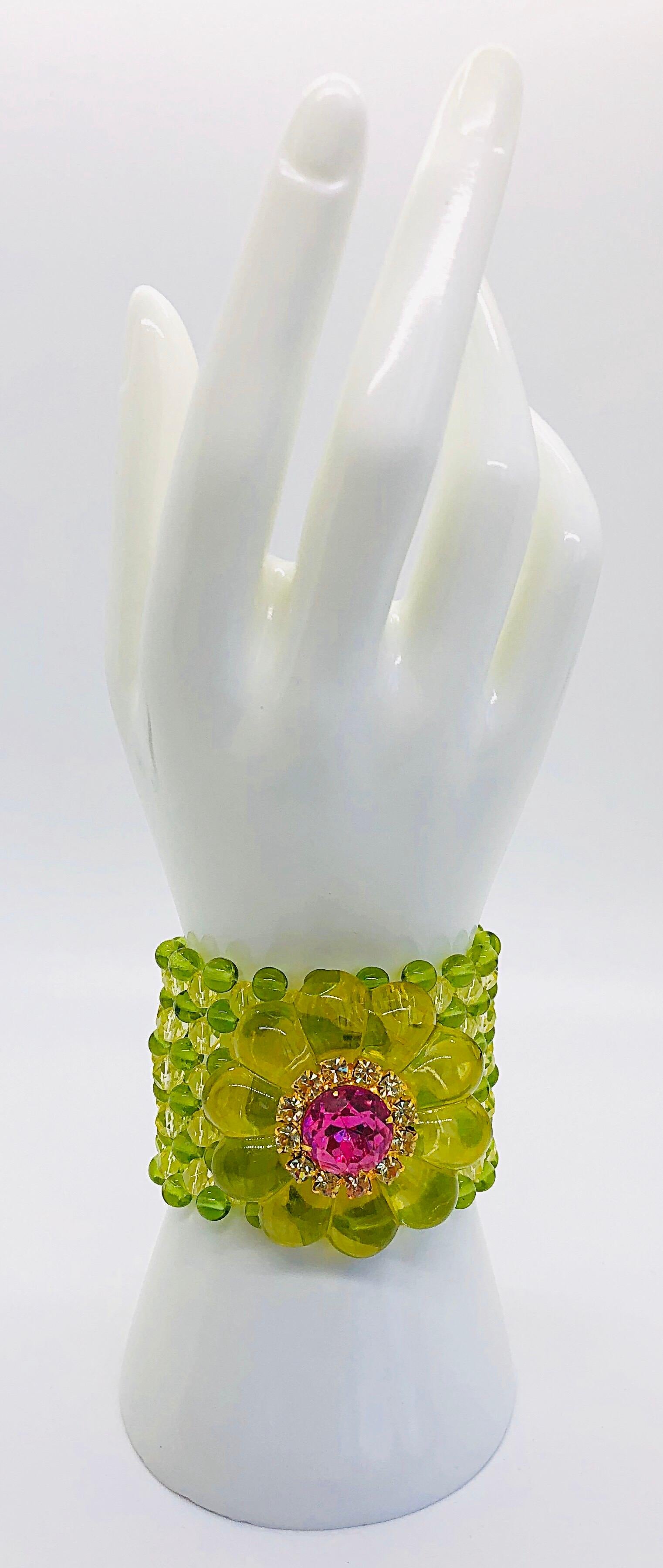 Chic 1960s mod neon lime green and hot pink large lucite beaded rhinestone bracelet cuff! Features intricate carved gold hardware closure. The perfect bold statement piece that can really add some pop to any outfit. Can easily be dressed up or down.