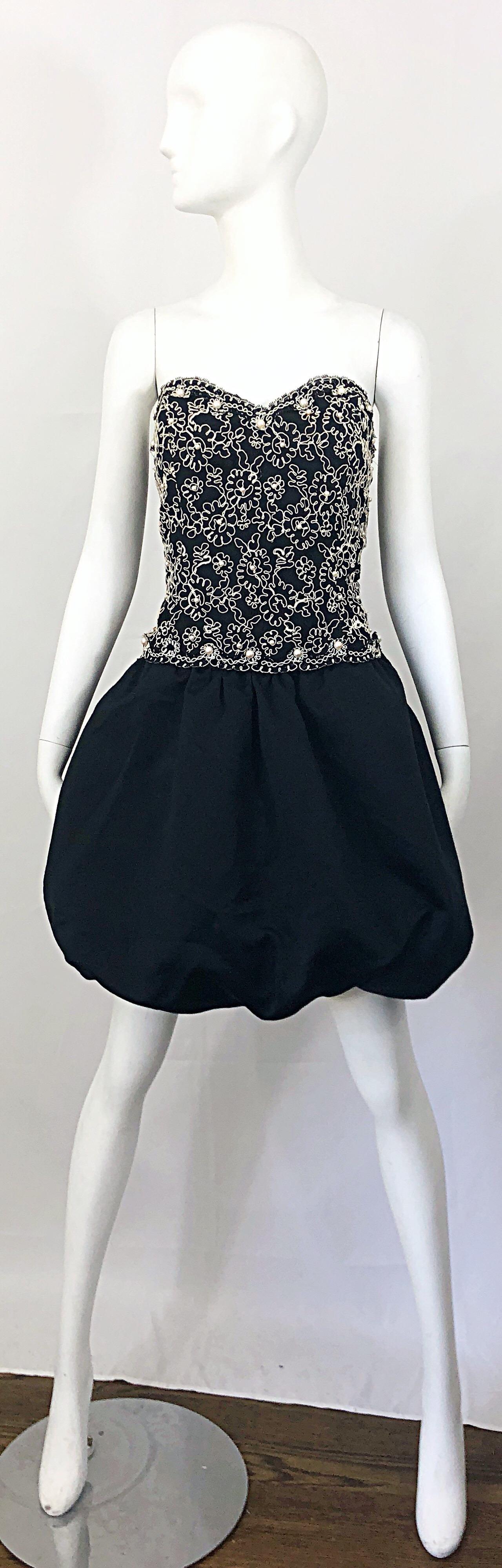 Chic vintage 80s black and white pearl encrusted Size 12 strapless embroidered party pouf dress! Features a fitted boned black bodice with white embroidery and hand-sewn pearls throughout. Forgiving pouf bubble skirt hides any 'problem' areas.