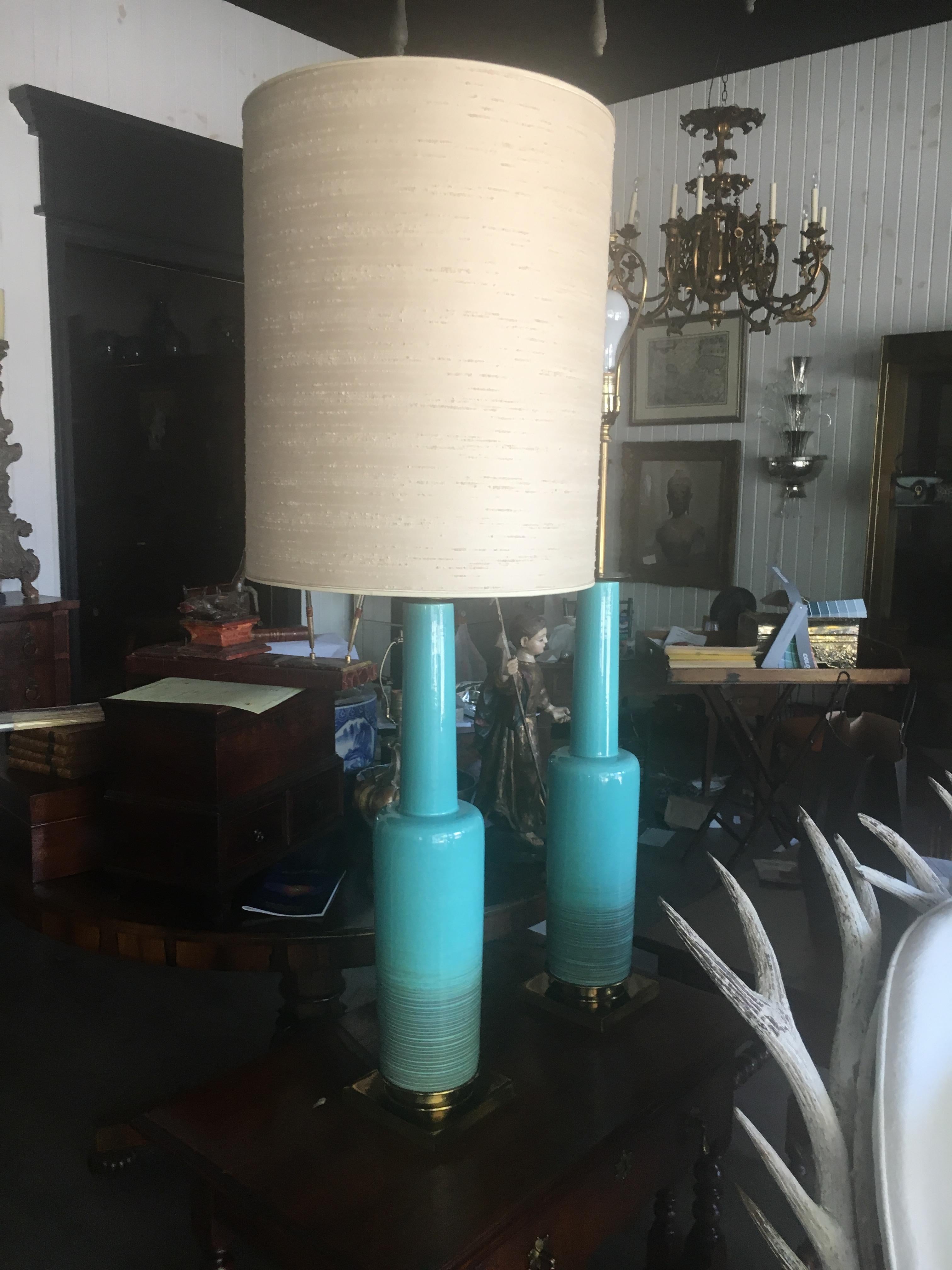 Chic and rare pair of midcentury Tiffany blue lamps with original shades. Pristine condition, great scale and color. 35