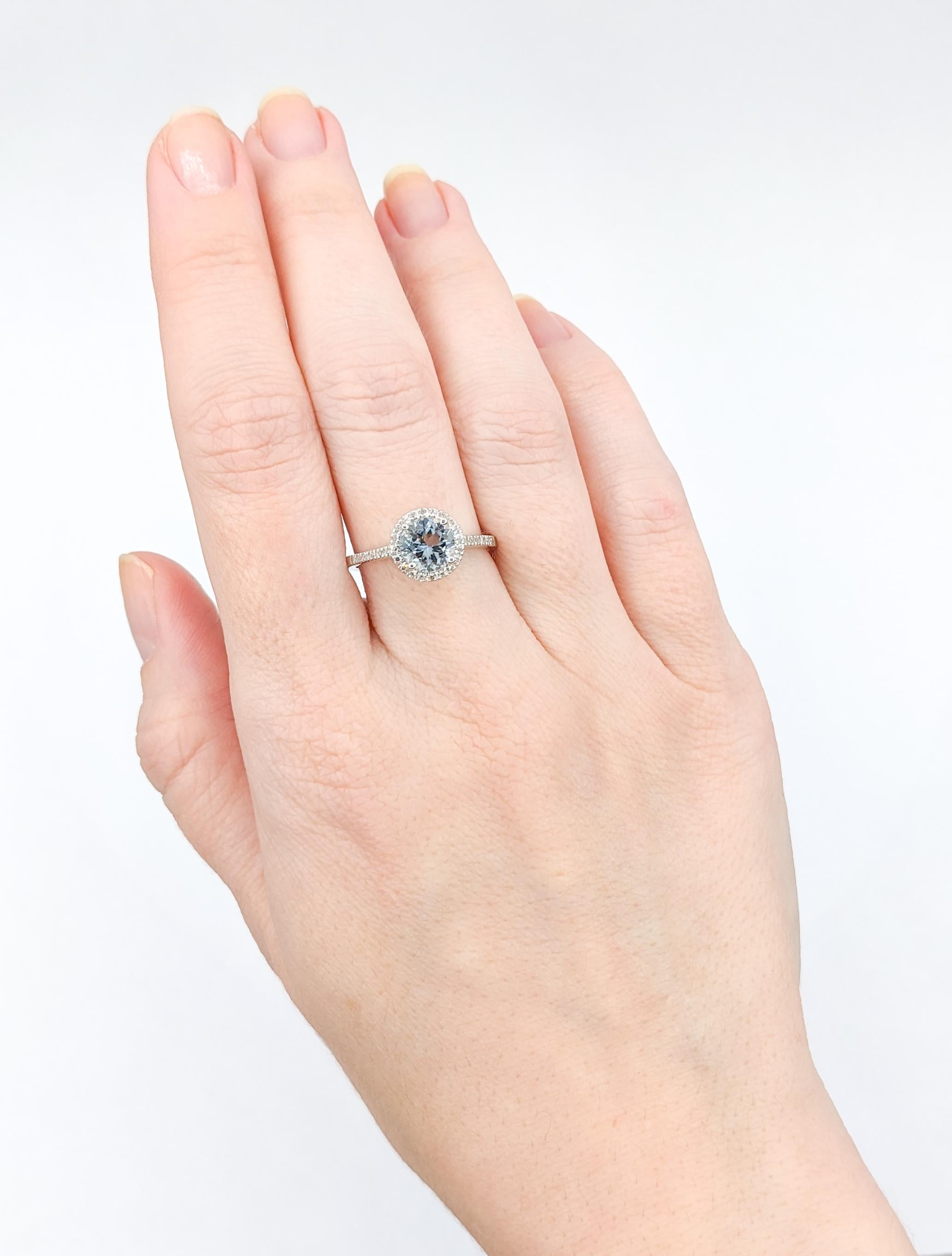 Chic Aquamarine & Diamond Halo Ring in White Gold

Discover elegance in every detail with this exquisite 14k white gold ring. Adorned with a breathtaking round 1.13 carat soft blue Aquamarine surrounded by a halo of .12ctw dazzling round diamonds.