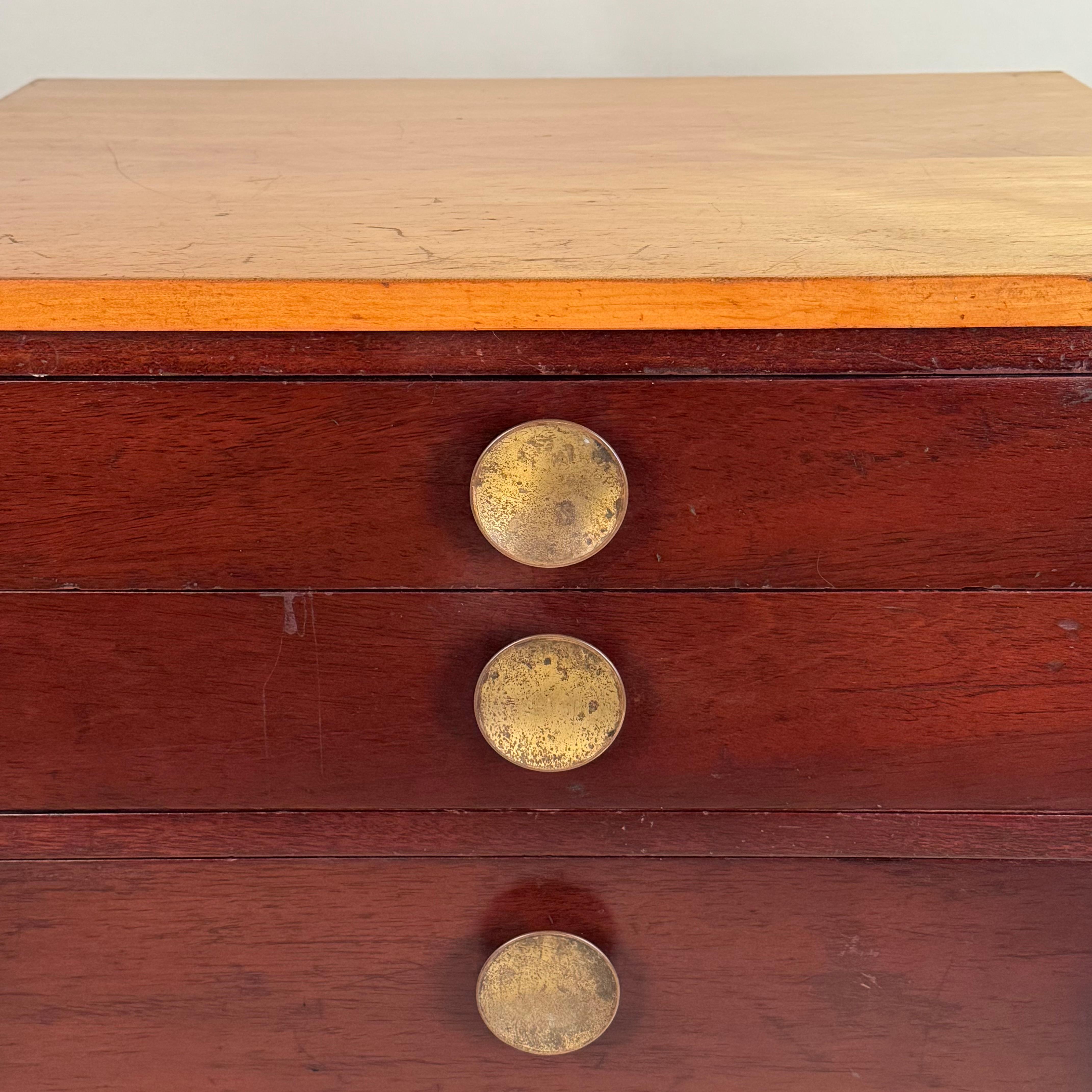 Brass Chic Art Deco Column of Drawers in the Style of Gilbert Rohde For Sale