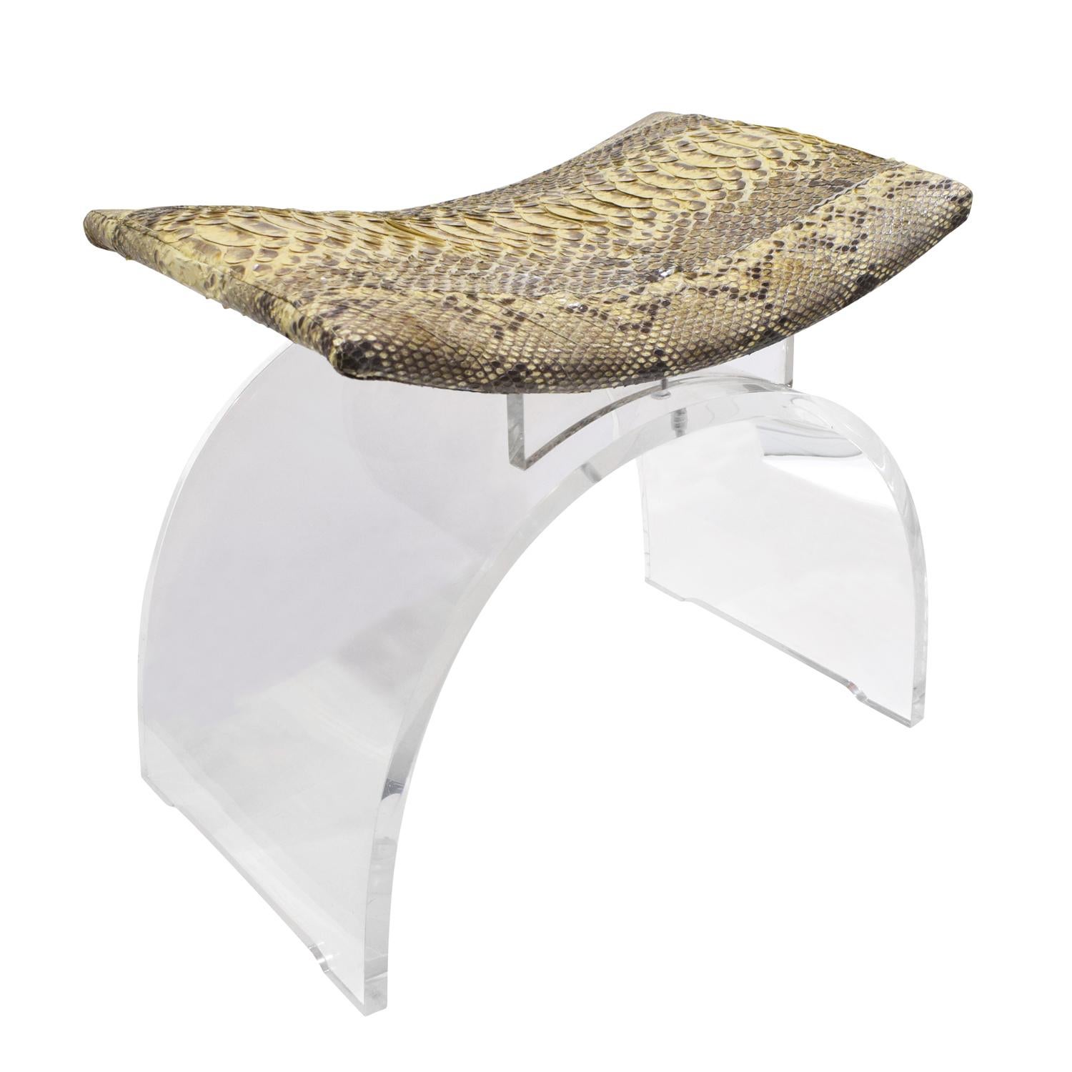 Sculptural bench in Lucite with python seat, American, 1970s. This bench is perfect for a vanity or accent piece.