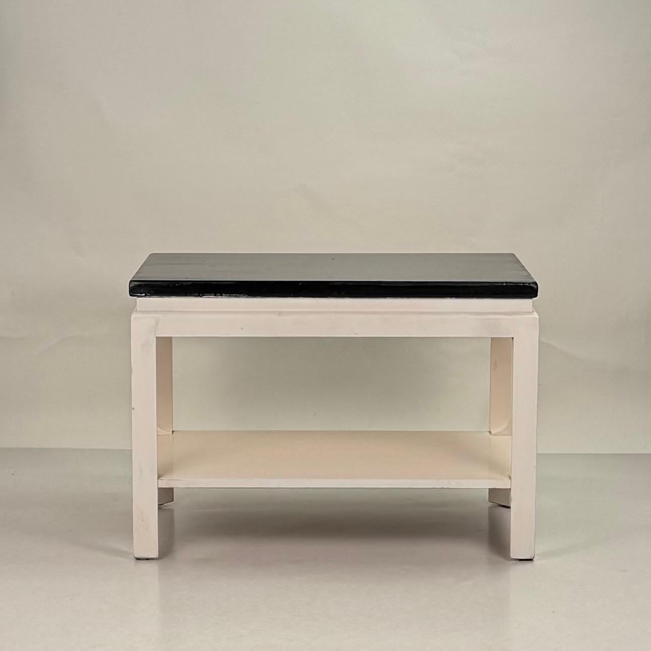 Perfectly proportioned side table by Paul Frankl. Black painted cork top resting on a white painted hardwood frame with a practical lower shelf. Also great as a tall small coffee table.

Paul T. Frankl (October 14, 1886 – March 21, 1958), an Art