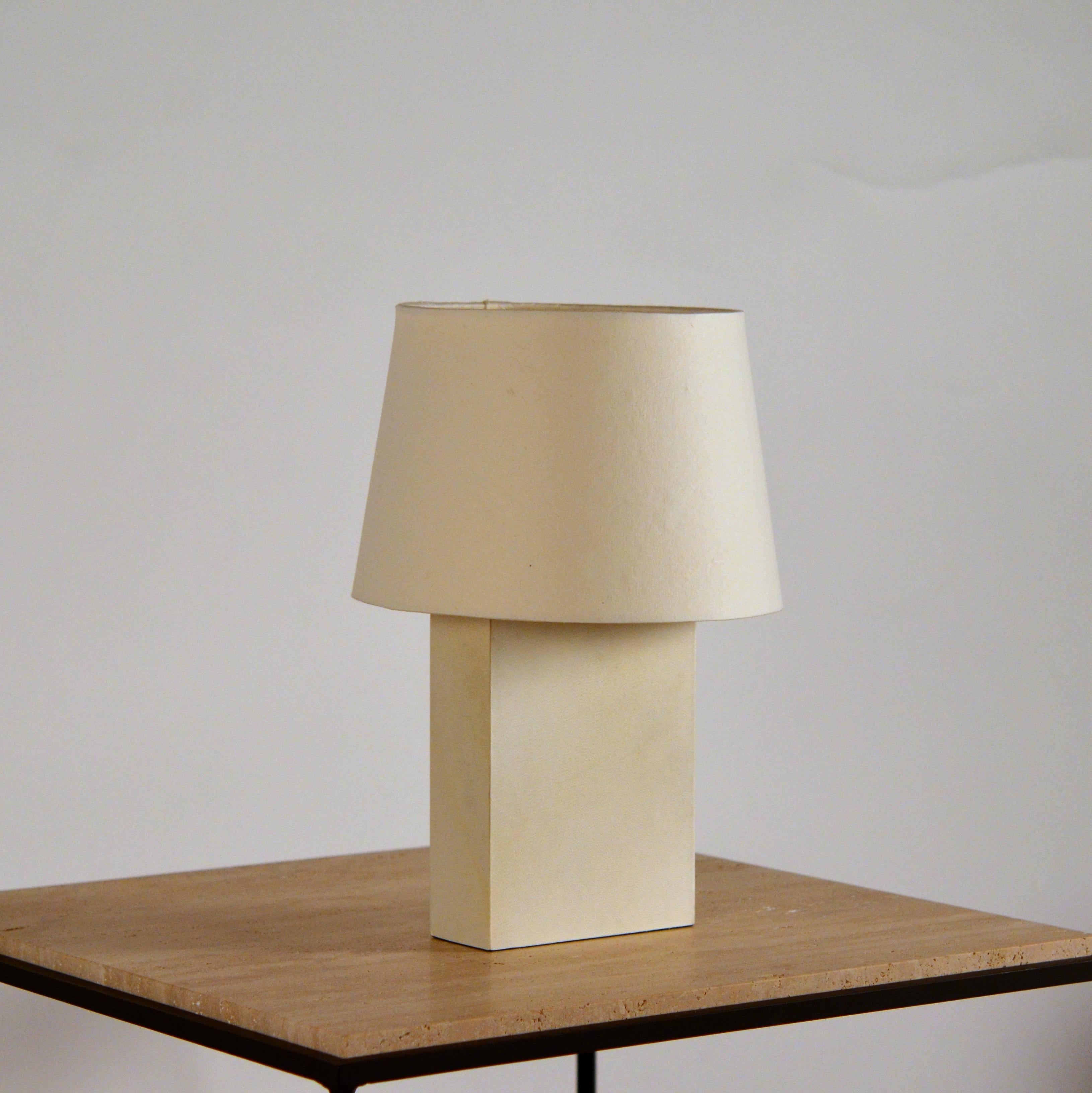 Chic 'Bloc' parchment table lamp by Design Frères.

Attractive European style shade mount with no apparent harp / final.

The dimensions are the overall dimensions of the lamp and the shade together. The shade is 10 in. diameter at base x 8 in.