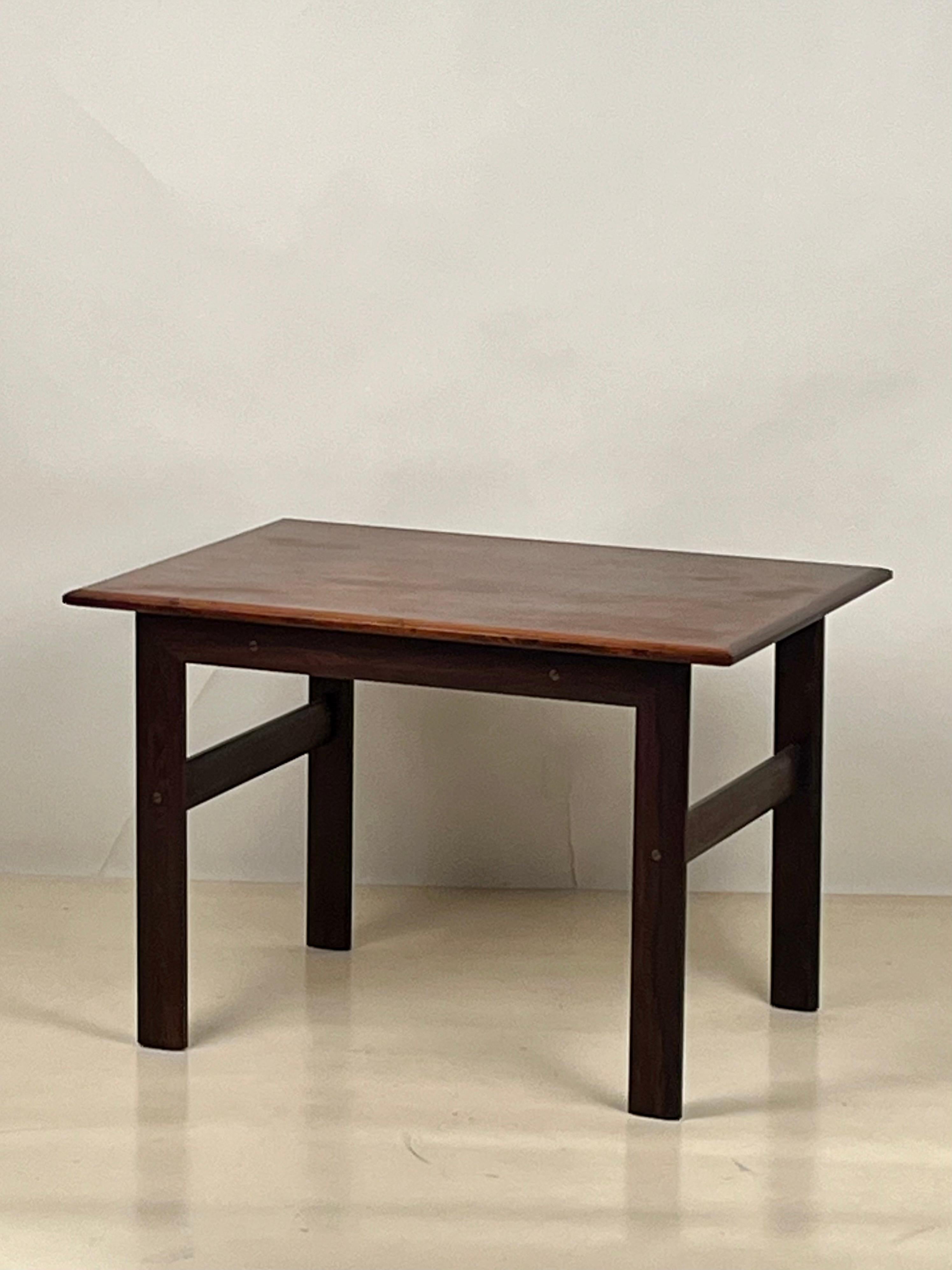 Solid rosewood frame with beautifully patterned rosewood veneer top.