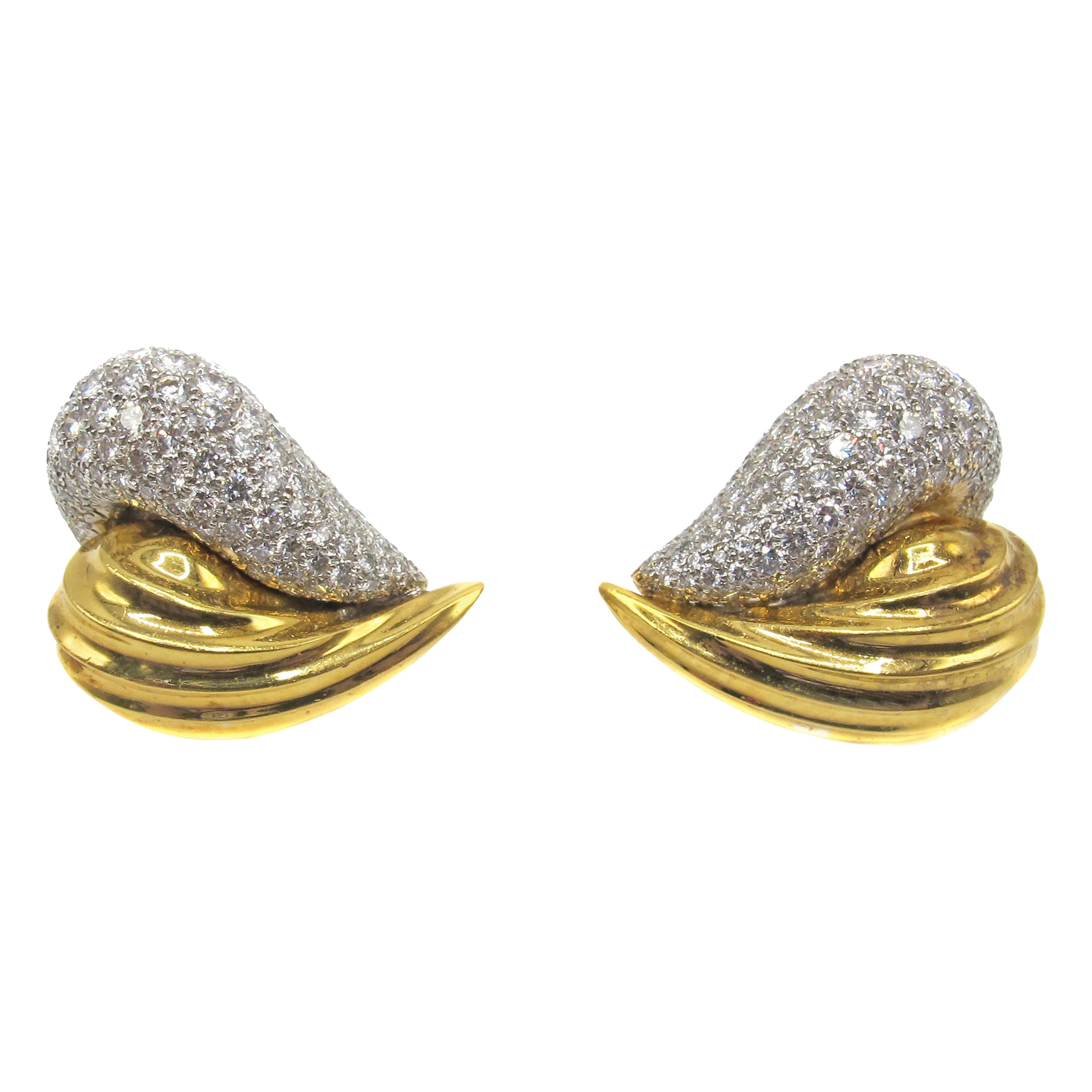 Clips d'oreilles chics en or bicolore et diamants