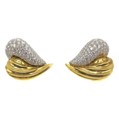 Clips d'oreilles chics en or bicolore et diamants