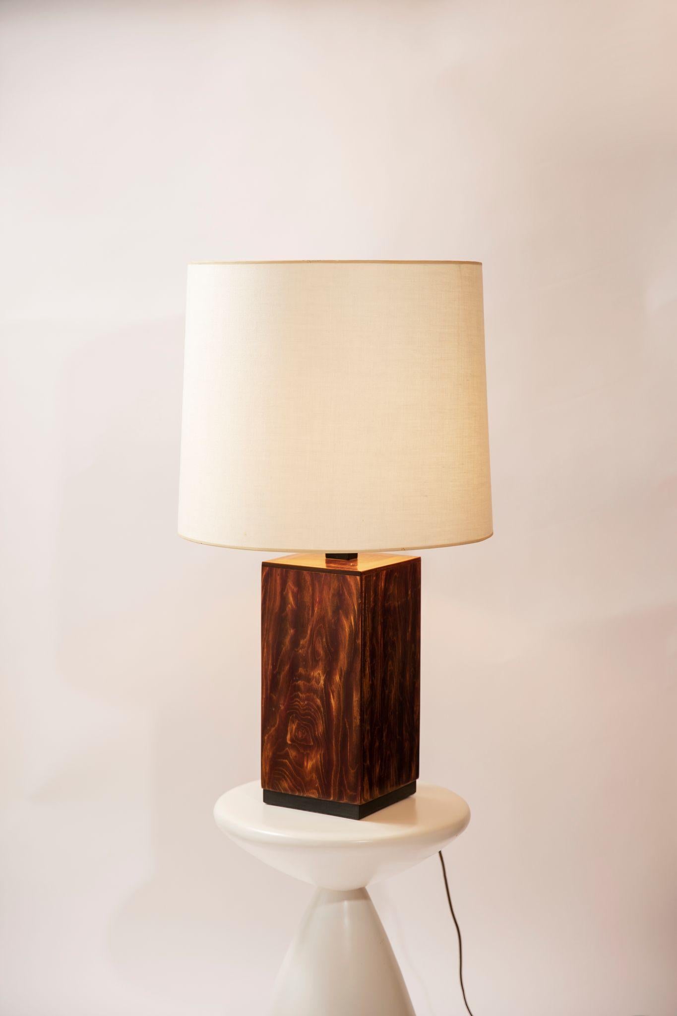 Rare exotic wood lamp with custom linen shade. Chic and understated.

The dimensions listed are the overall dimensions of the lamp with the shade: 17 in. diameter x 30 in. tall (overall).