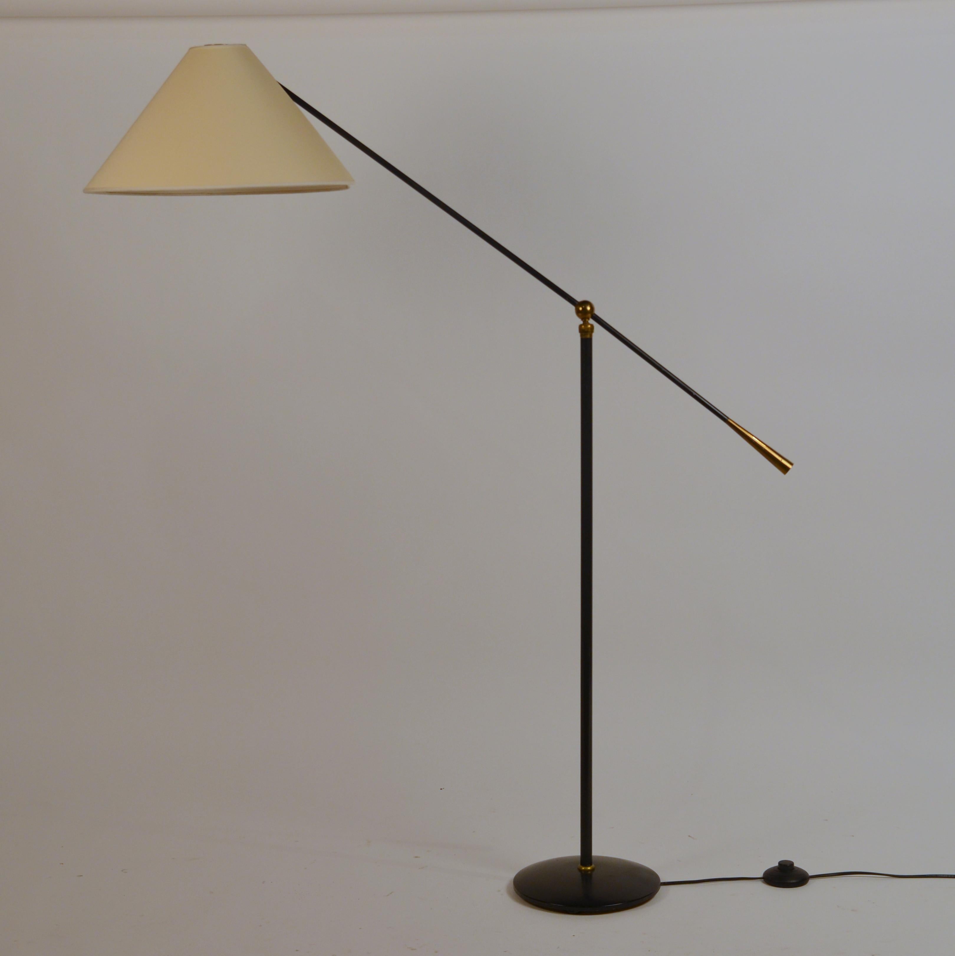 Chic French 1950s articulated floor Lamp by Maison Lunel. Great reading lamp next to an armchair or a sofa.