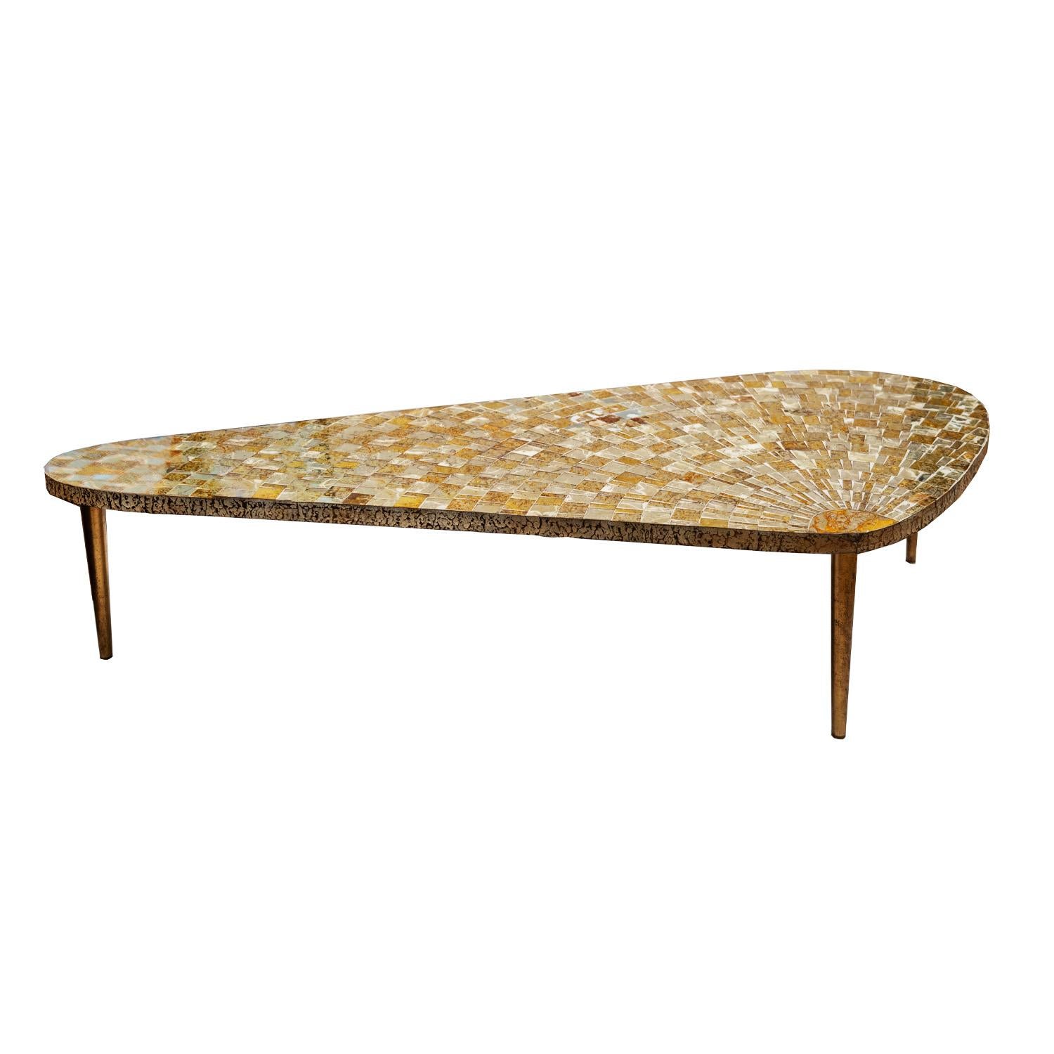 Artisan coffee table with tessellated glass top with reverse etched oxidized gold and platinum with tapering brushed bronze legs, Italian 1950's. The tessellated glass makes for a unique, luminous appearance.

 