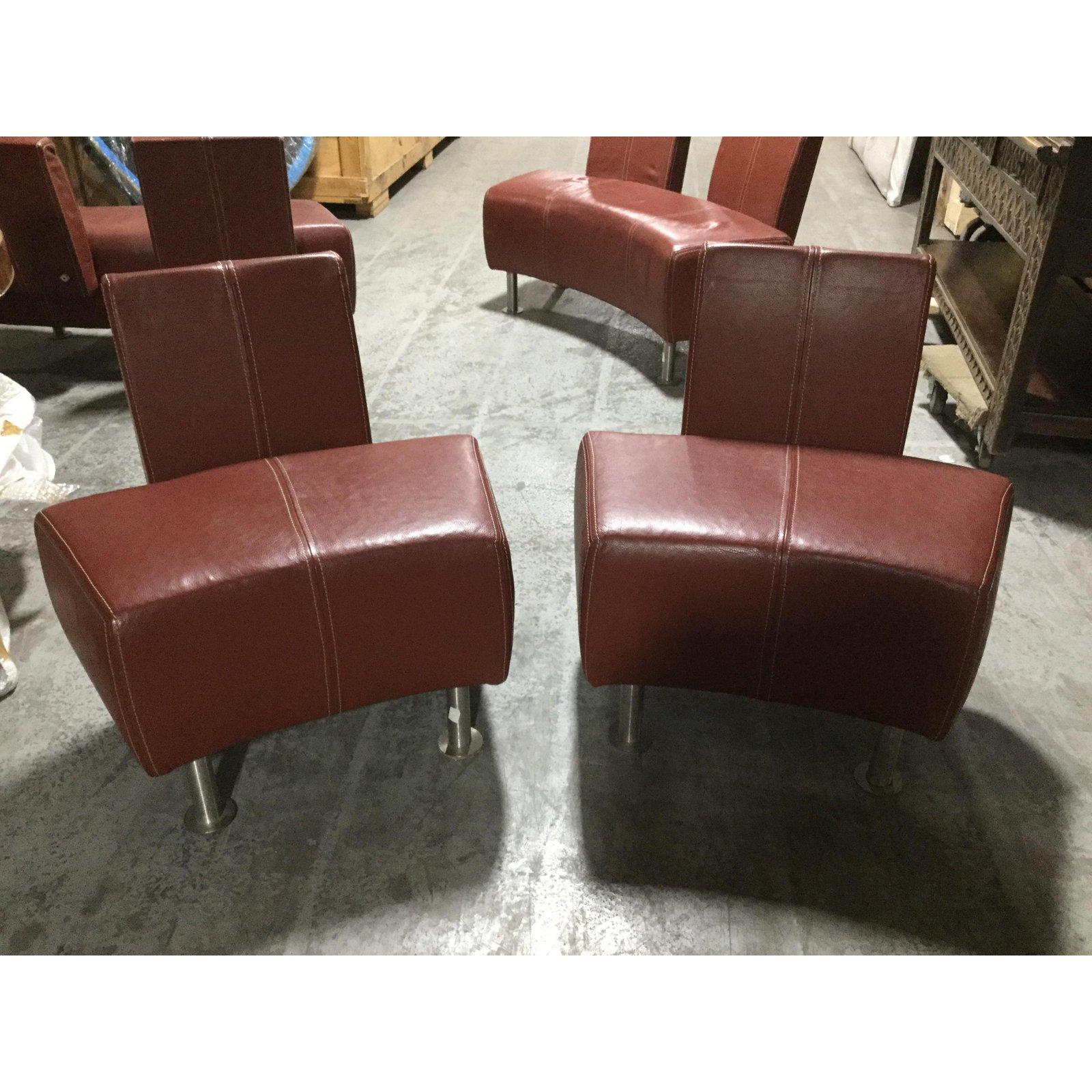 Exceptional Italian designer chic ox blood leather salon set including a curved loveseat and 2 side with white top stitching and cool steel industrial legs. The loveseat bench has a slight curve in the front and would be great floating in a room