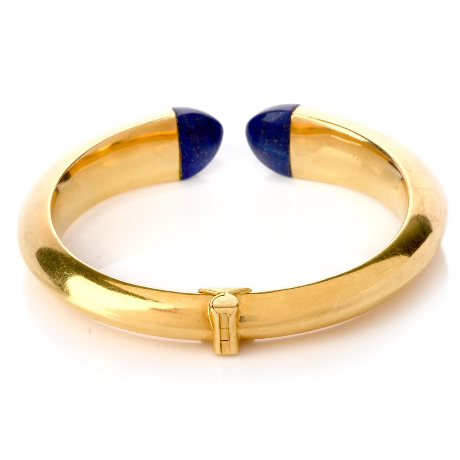 Invest in a statement yet minimalist piece in your wardrobe with this Vintage Lapis Lazuli 18K Yellow Gold Chic Cuff Bangle Bracelet!  This stylish trending cuff bangle has two genuine lapis lazuli of triangle cabochon shape Measuring 13mm