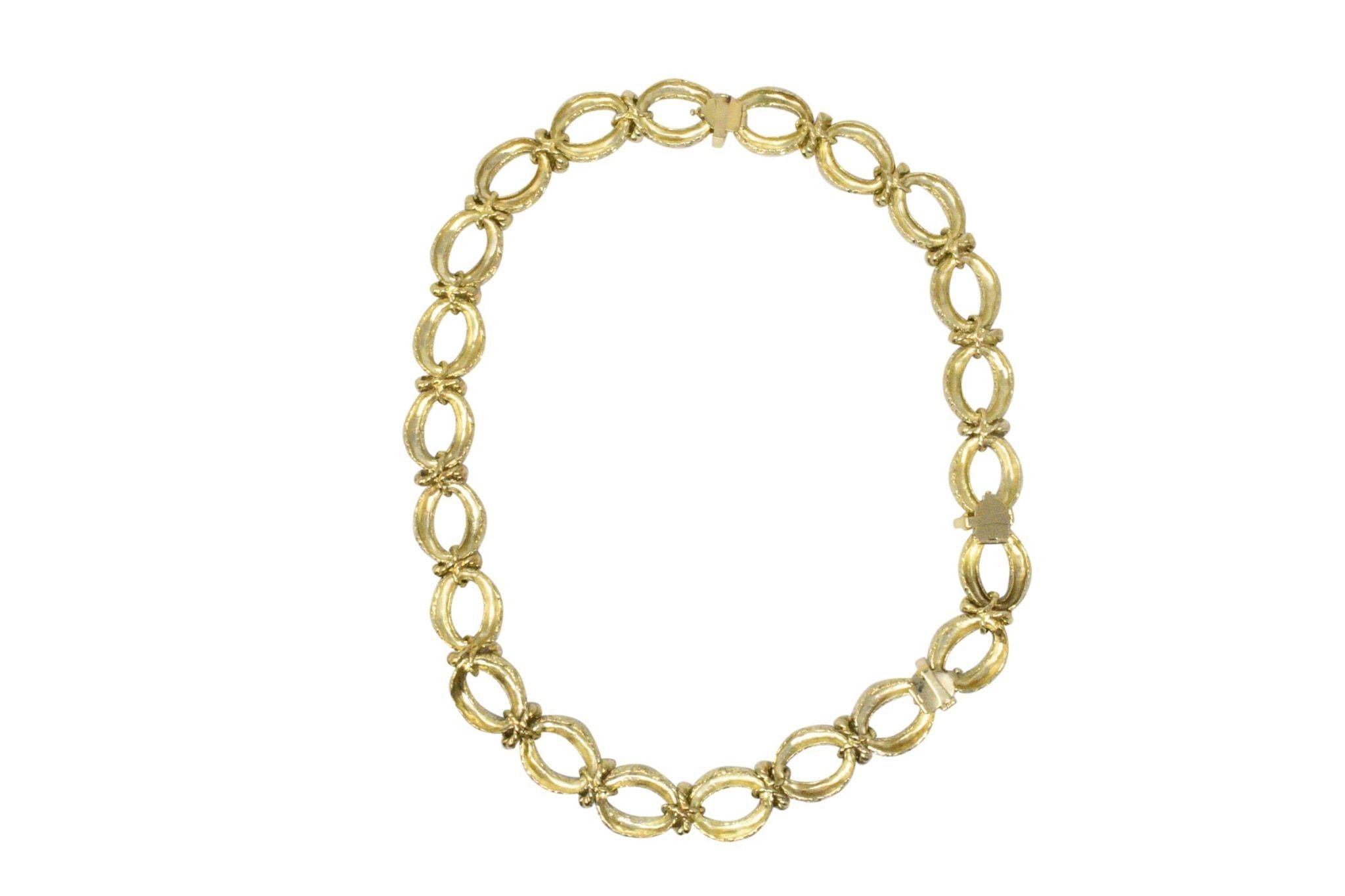 Textured gold open oval links connected with polished twisted gold
Separates into a necklace, bracelet and two link extender
So many different ways to wear this bold and bright piece! 
Total Length: 26 1/2 inches, Necklace: 16 inches  Bracelet: 7