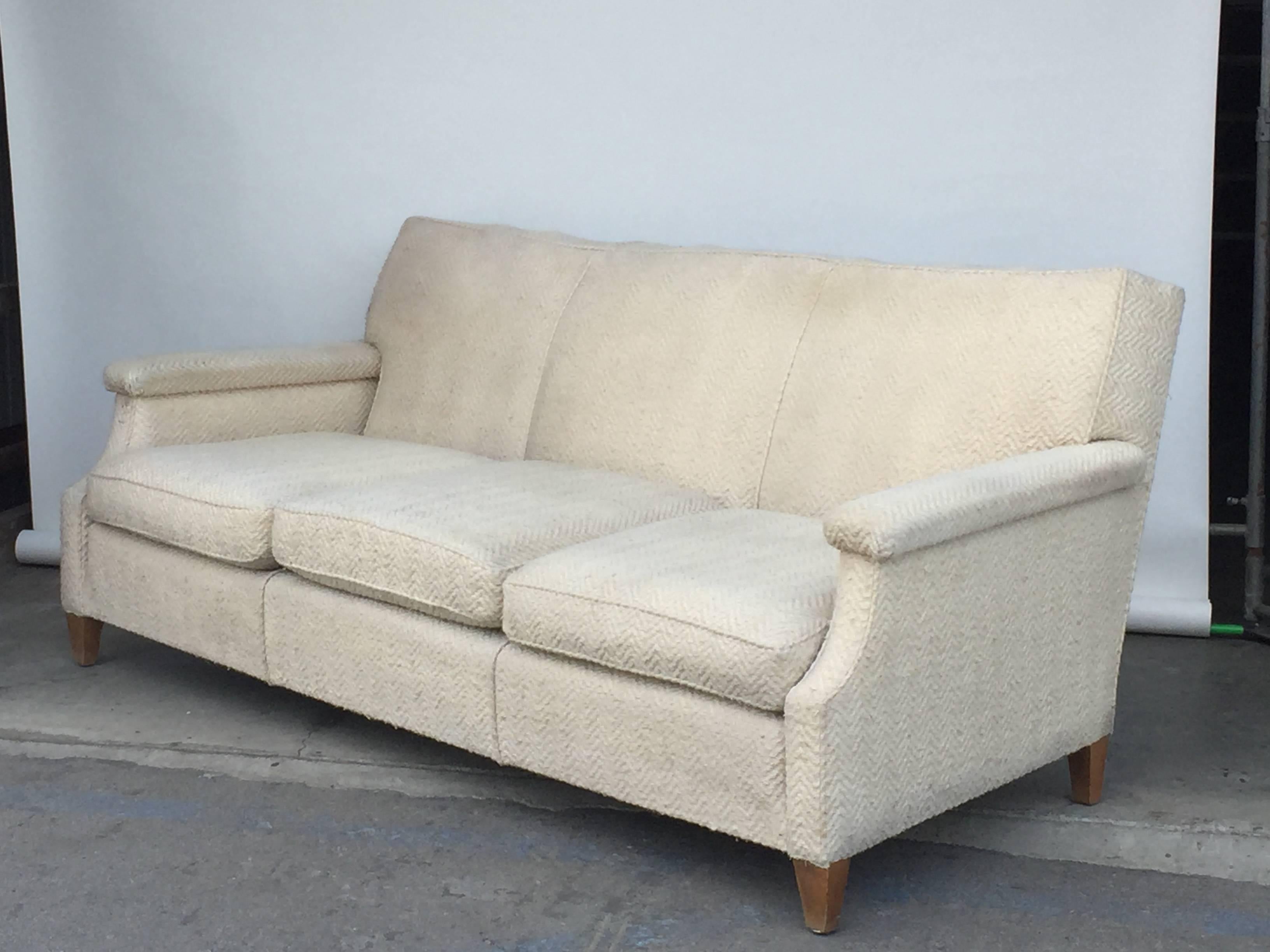 Chic large French 1950s sofa by Maison Leleu, Paris.