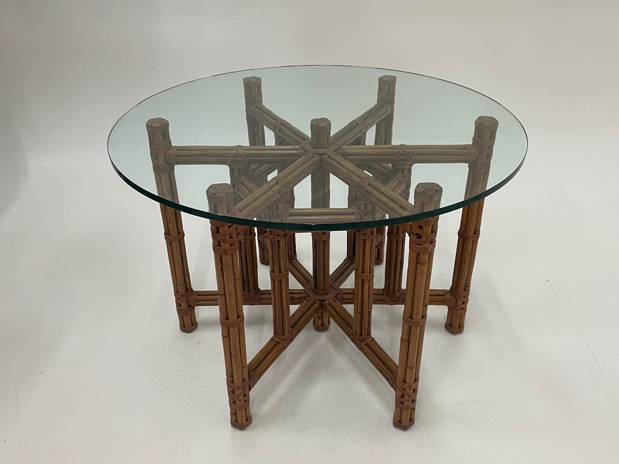 Classic McGuire dining table base with their signature bamboo and rattan handiwork wrapped with pieces of leather. Glass not included. Base serves well for 48