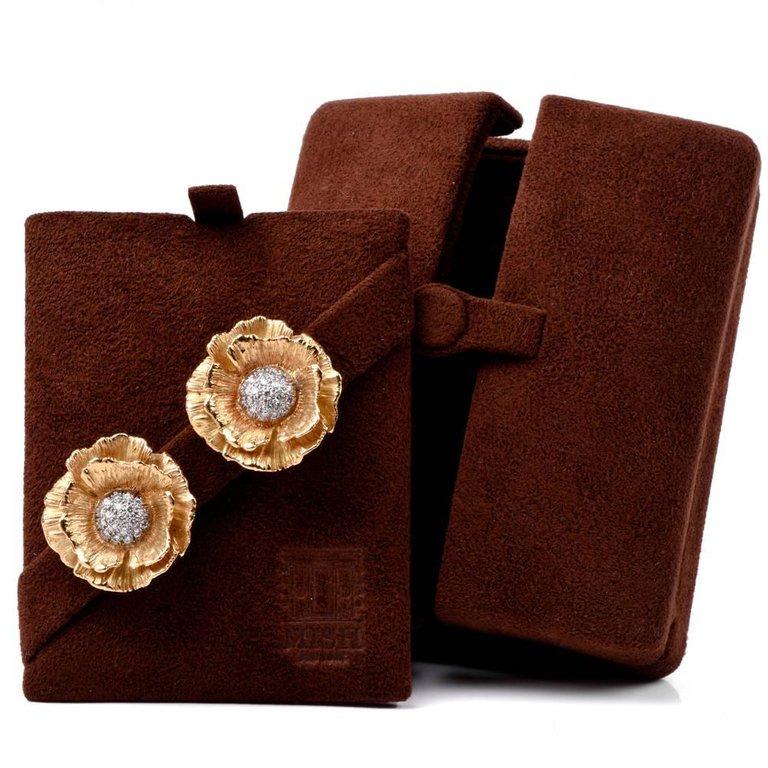 These chic diamond flower earrings in 18-karat textured matted yellow gold are made by Mish Tworkowski of Manhatten , bearing the designer's signature 'MISHNY' on reverse. Designed in contemporary style, referred to by the artist as the 'Saloniste