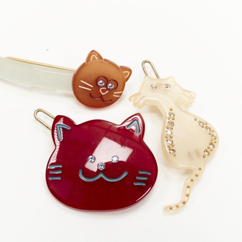CHIC & MODE Alexandre Zouari cravate pince à cheveux en cristal chat rouge peigne X10 Pour femmes en vente
