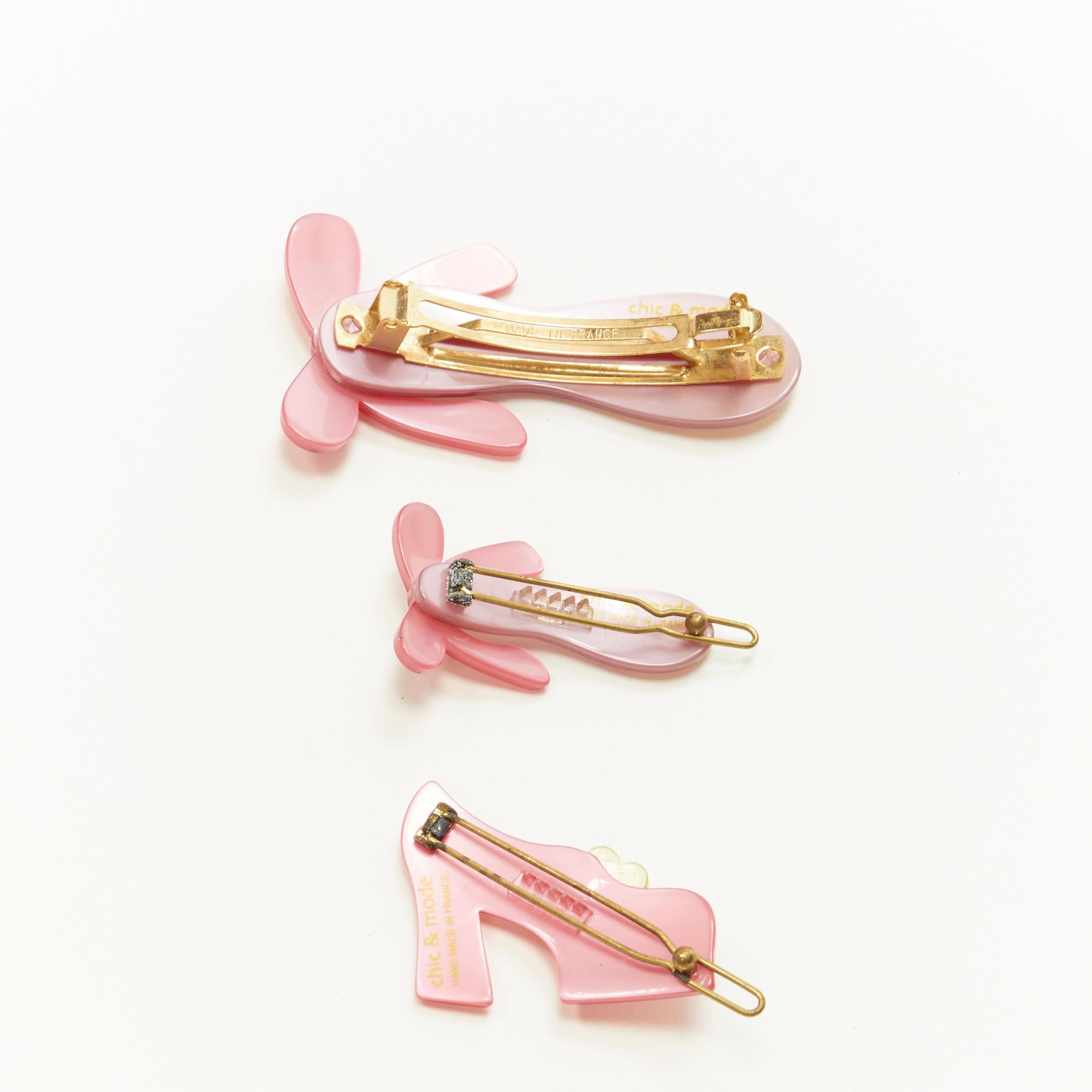 CHIC & MODE Alexandre Zouari LOT OF 3 pink ballerina shoes hair clip 
Reference: ANWU/A00243 
Brand: Chic and Mode 
Designer: Alexandre Zouari 
Material: Plastic 
Color: Pink 
Pattern: Solid 
Closure: Clip 
Extra Detail: Large clip 7cm. Small clip