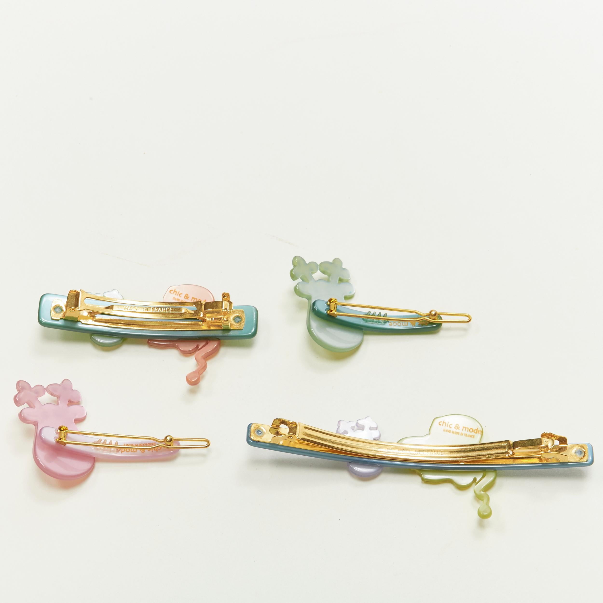 CHIC & MODE Alexandre Zouari LOT OF 4 Santa reindeer crystal acrylic hair band 
Reference: ANWU/A00239 
Brand: Chic and Mode 
Designer: Alexandre Zouari 
Material: Plastic 
Color: Green 
Pattern: Solid 
Extra Detail: 2 clasp clip. 2 mini pin clip.