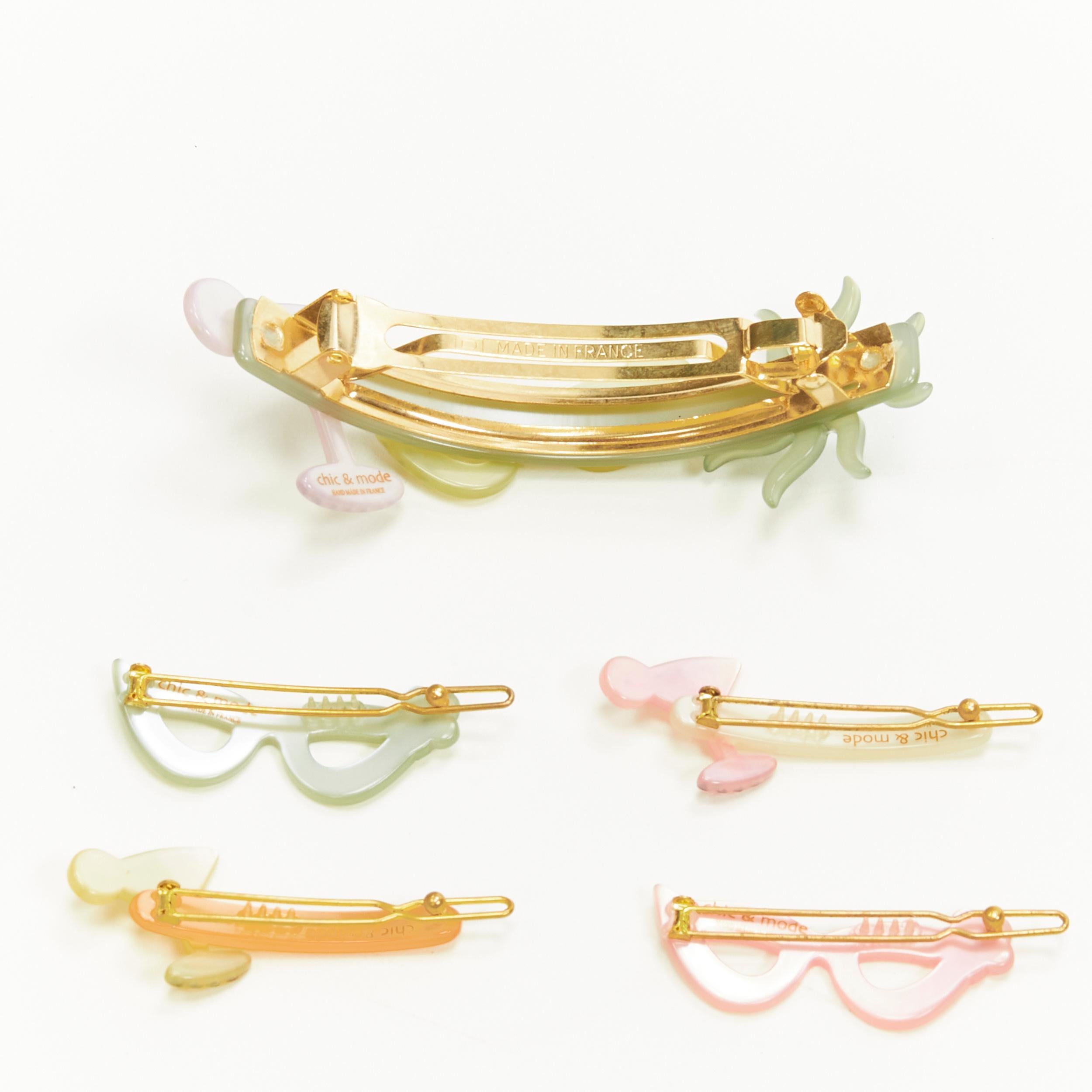 CHIC & MODE Alexandre Zouari LOT OF 5 cateye martini acrylic hair clip 
Reference: ANWU/A00259 
Brand: Chic and Mode 
Designer: Alexandre Zouari 
Material: Plastic 
Color: Multicolour 
Pattern: Solid 
Closure: Clip 
Extra Detail: Small clips 6cm.