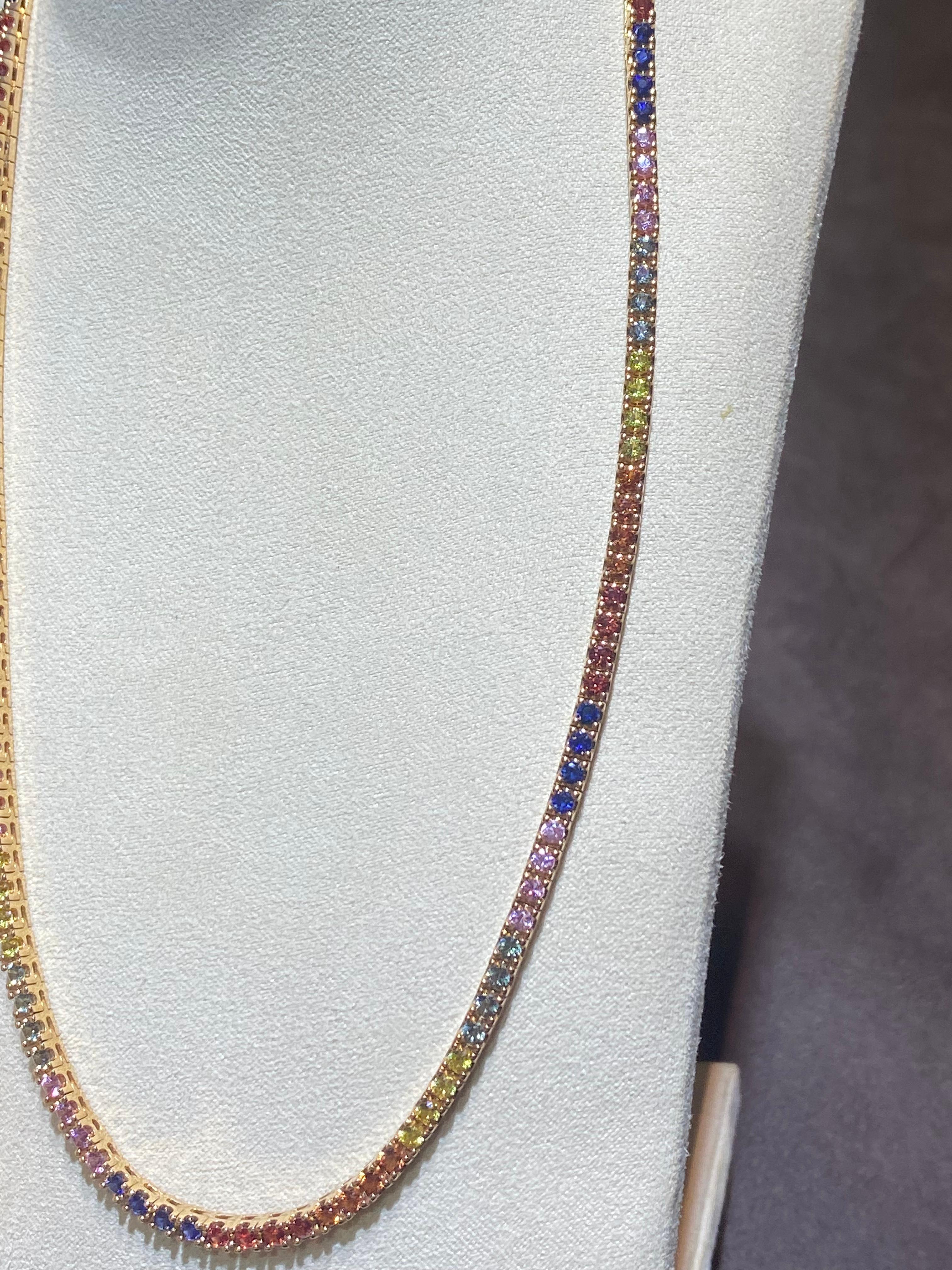 Yellow 18K Gold Necklace

Weight 28,56 grams

Size 43 cm

Blue Sapphire 1,43  ct -25 pieces
Green Sapphire  1,41  ct- 24 pieces
Orange Sapphire  1,44 ct -24  pieces
Pink 1,43 Sapphire  1, 43ct - 24 pieces
Red Sapphire  1,43 ct - 24  pieces
Yellow