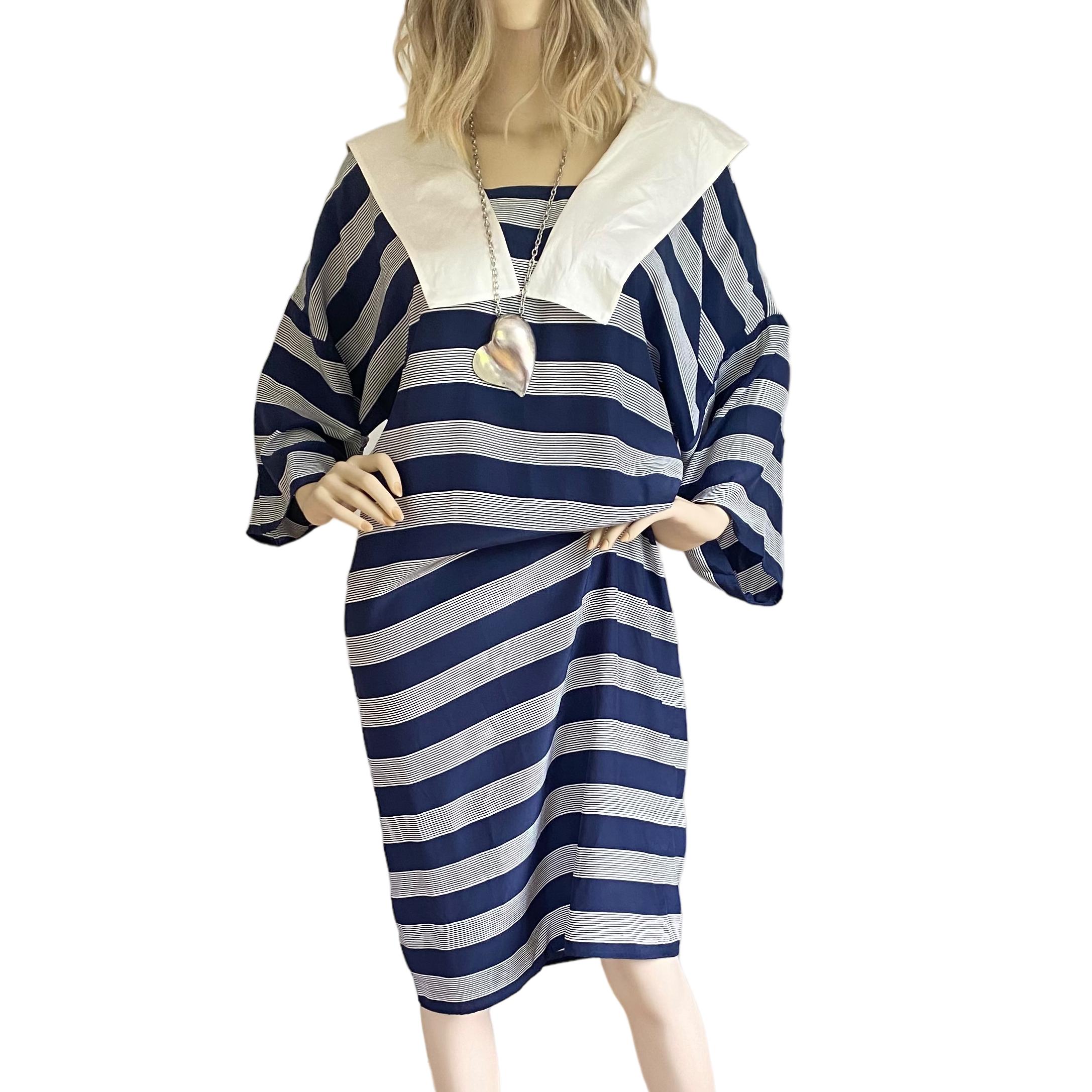 Loose fit, cool stripe sailor Marina dress.
Perfectly matched stripes at each side seam - a sign of Flora's attention to detail and no expense spared.
Pulls over head, comfort fit. Perfectly chic and easy to accessorize.
Fabric: long-filament silk