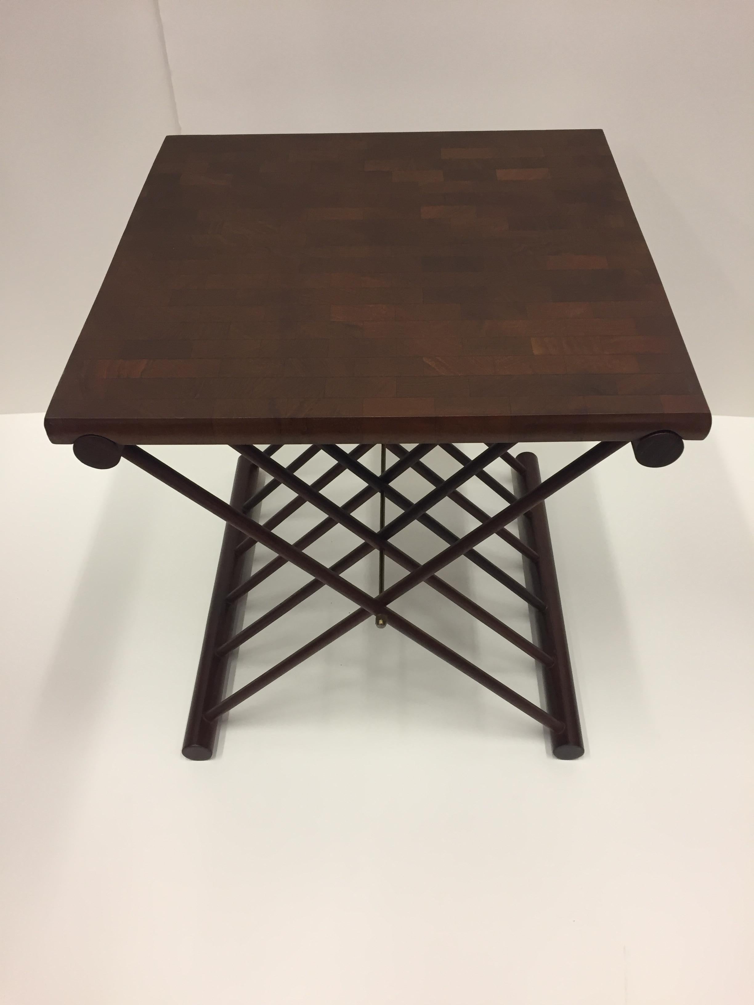 Great looking pair of square genuine Mandalay teak end tables having handsome folding criss cross bases.