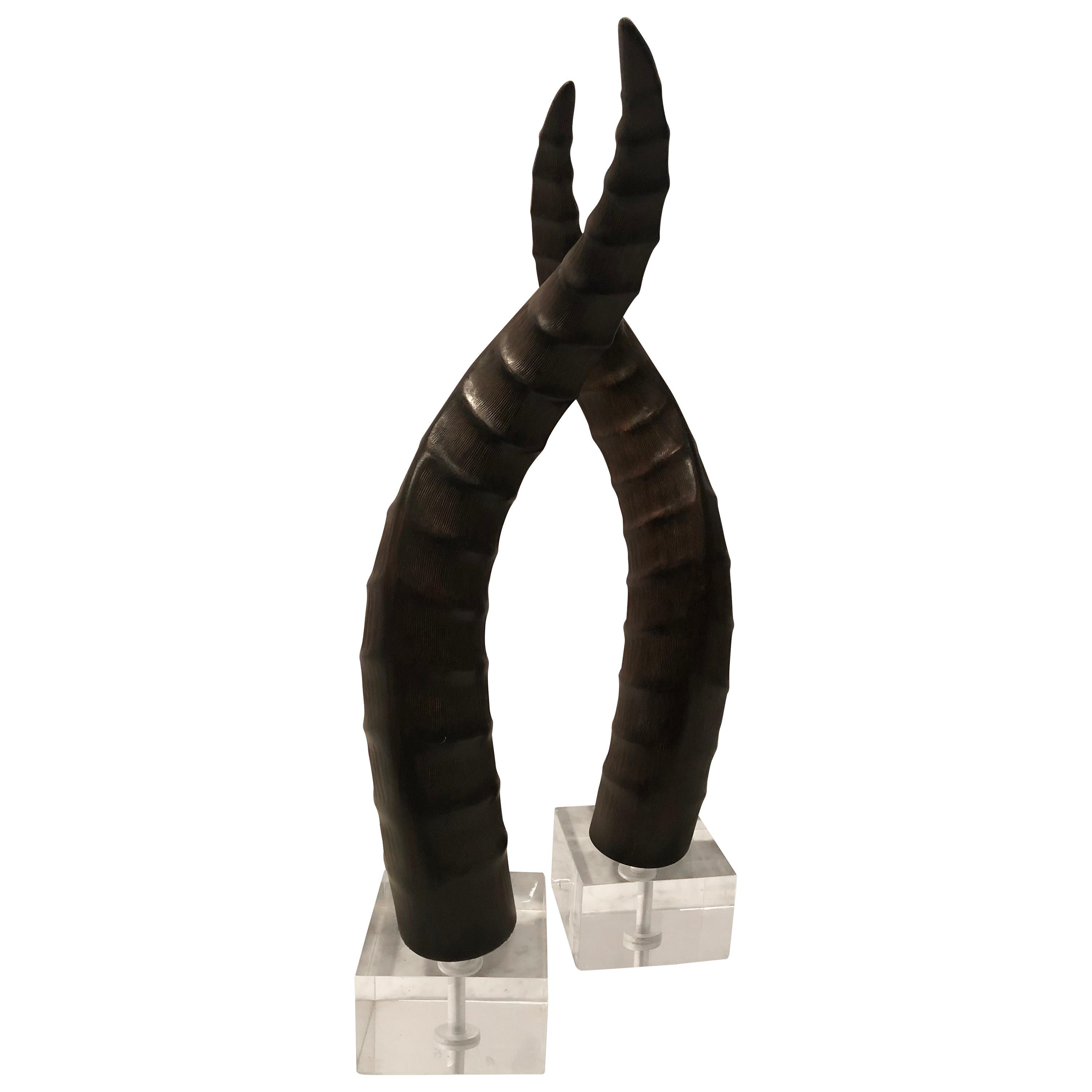 Chic Pair of Faux Horns on Lucite Bases For Sale