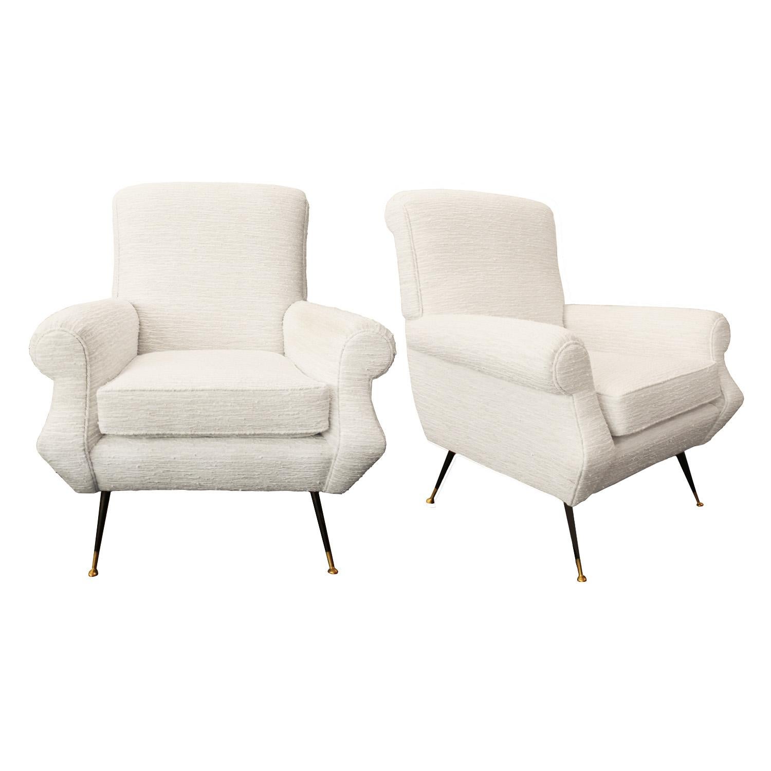 Stylish pair of Mid-Century Modern lounge chairs with steel and brass legs. Italy 1950s

Newly upholstered by Venfield in white textured fabric.