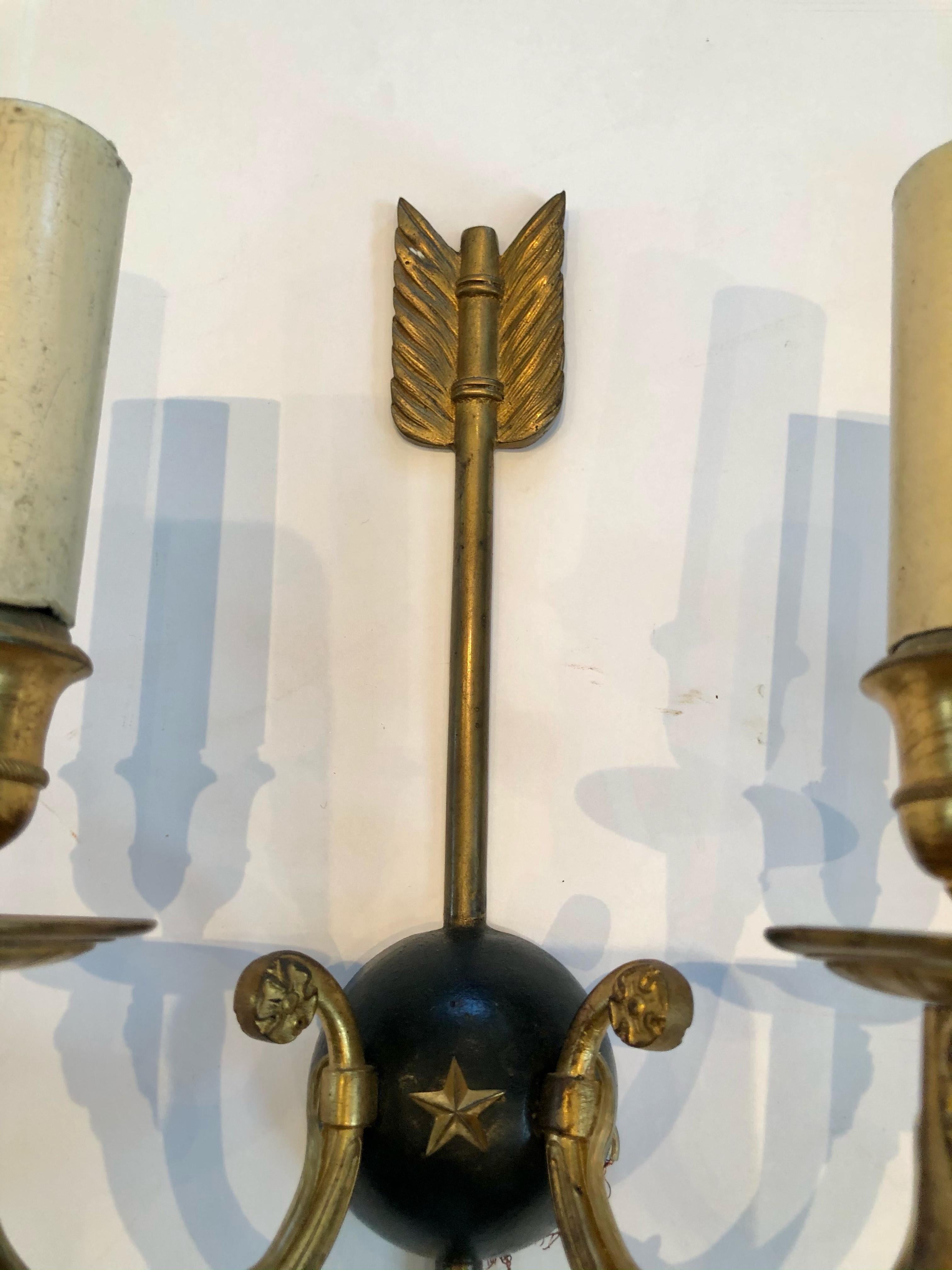 Brass Chic Pair of Regency Style Arrow Motif Wall Sconces with Rams Head Decoration