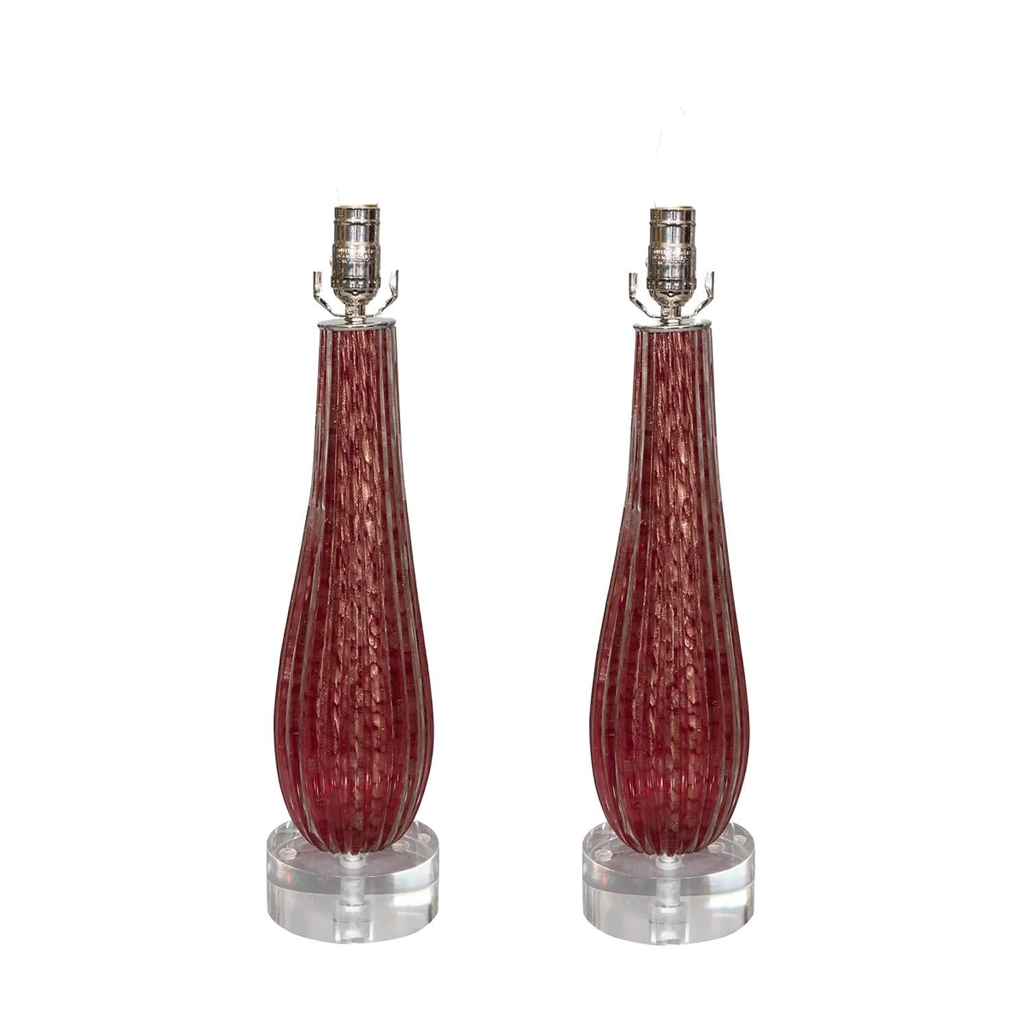 Pair of Murano ruby red rigadin glass lamps on acrylic bases. Italy, 1950's
Lamp shades are not included.
