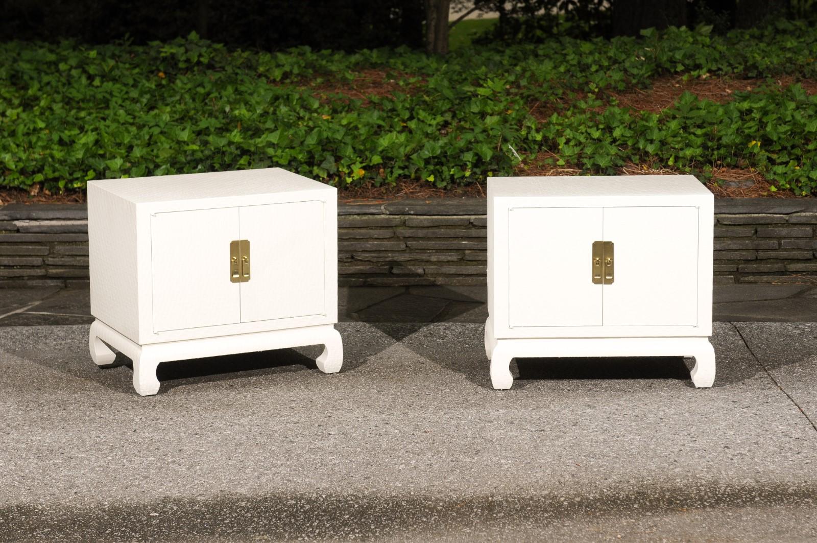 This magnificent pair of small commodes is shipped as professionally photographed and described in the listing narrative: Meticulously professionally restored and completely installation ready.

A fabulous pair of cabinets from a coveted and