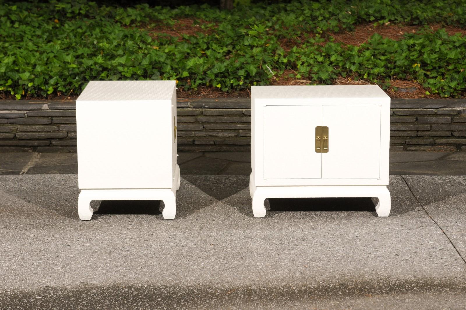 Late 20th Century Chic Restored Pair of Cream Lacquer Raffia Commodes by Baker, circa 1975 For Sale
