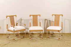 Staggering Restored Set of 8 Iconic Lucite and Rattan Dining Chairs, circa 1975