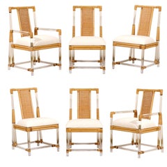 Staggering Restored Set of 8 Iconic Lucite and Rattan Dining Chairs, circa 1975