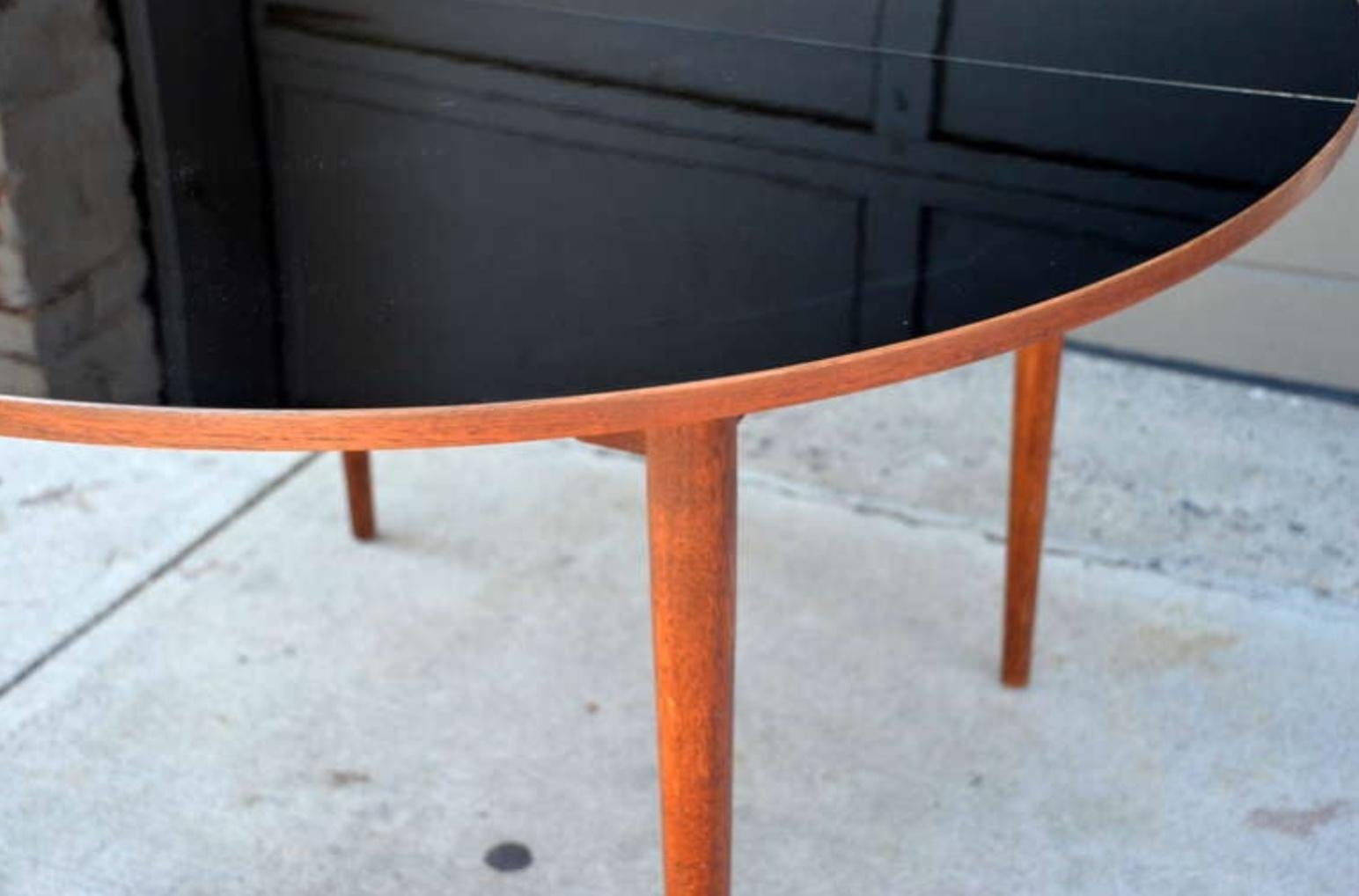20th Century Chic Scandinavian Teak Table with Durable Black Laminate Top For Sale