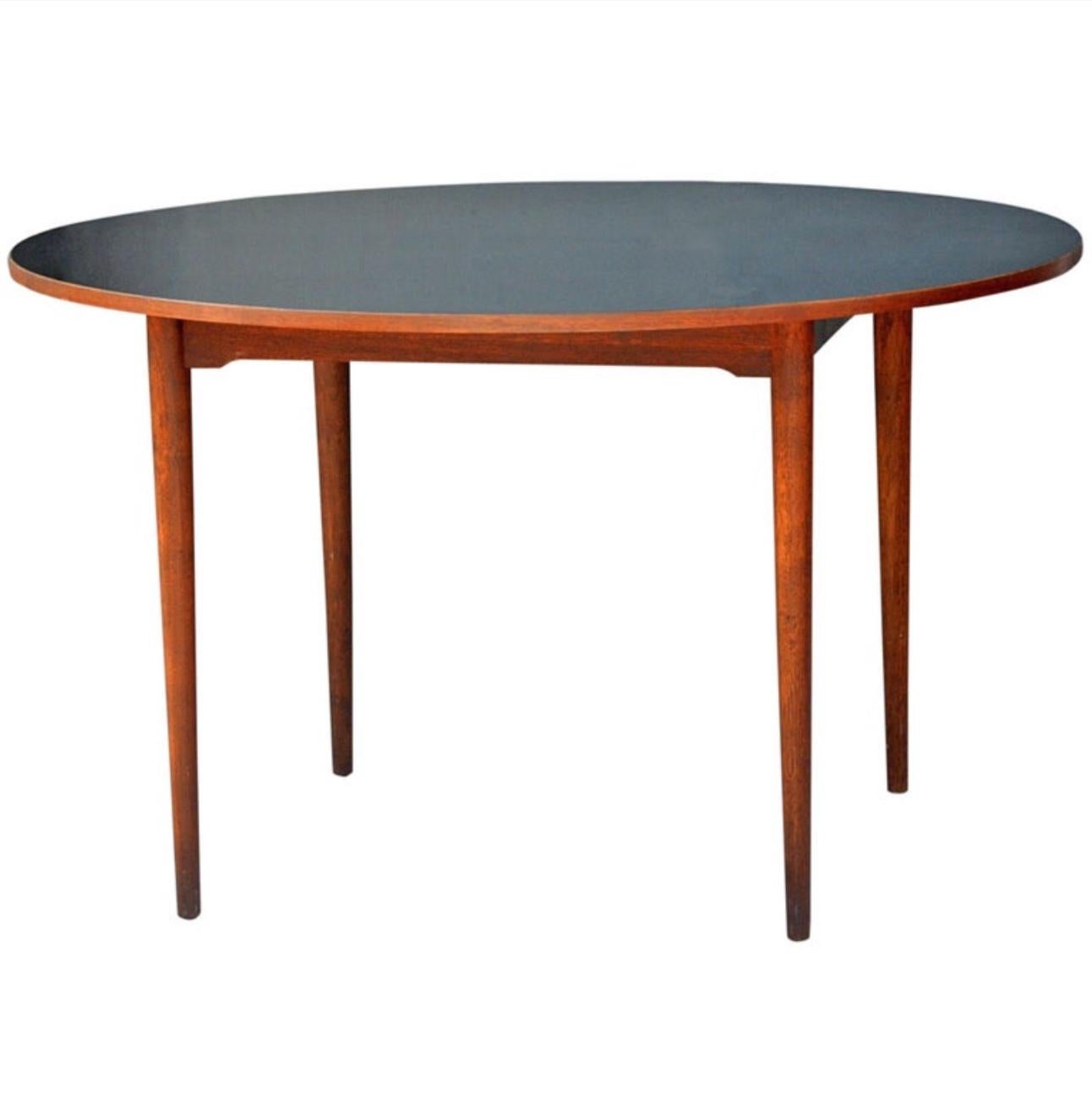 Chic Scandinavian Teak Table with Durable Black Laminate Top For Sale