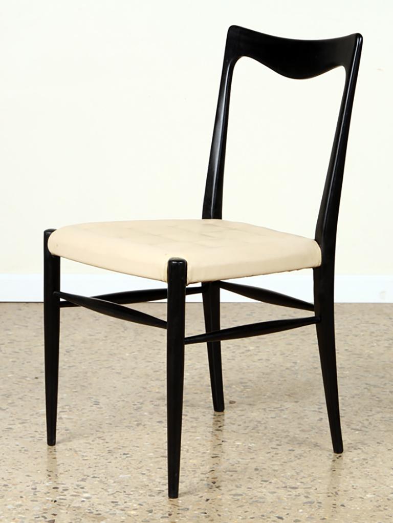 Chic set of 6 modern ebonized dining chairs having an ivory stitched seat.