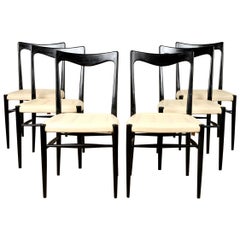 Chic Set of 6 Modern Ebonized Dining Chairs Having an Ivory Stitched Seat