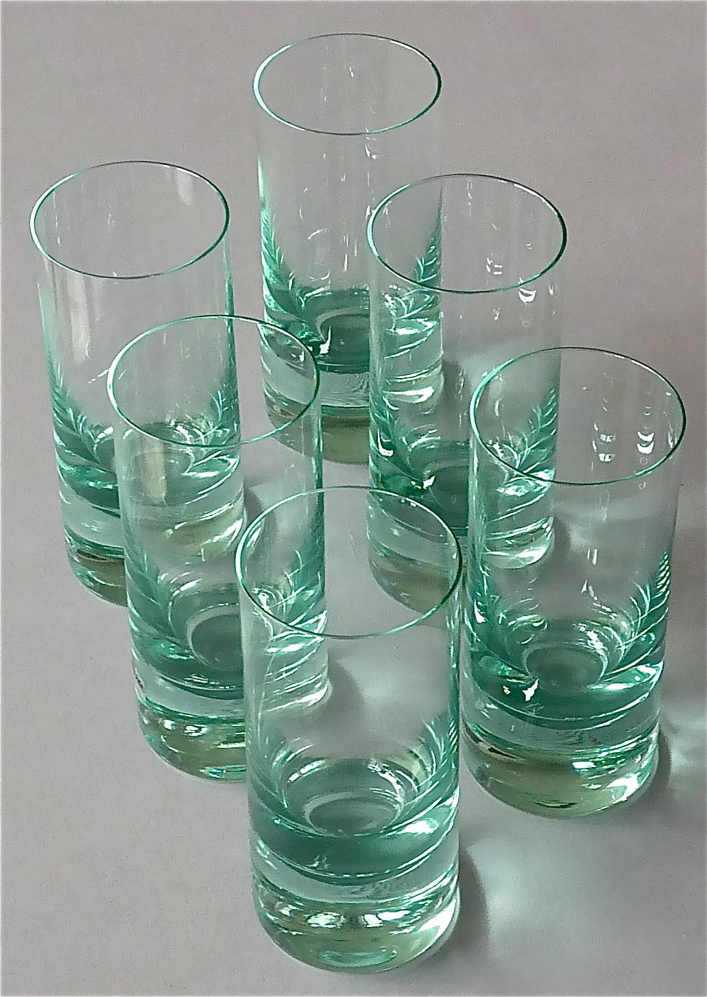 Chic set of six water / long drink / cocktail crystal glasses designed and executed in the 1960s by Moser Czechoslovakia. The high end quality of the glass is famous and can easily compare to Saint Louis and Baccarat in France. The used color of the