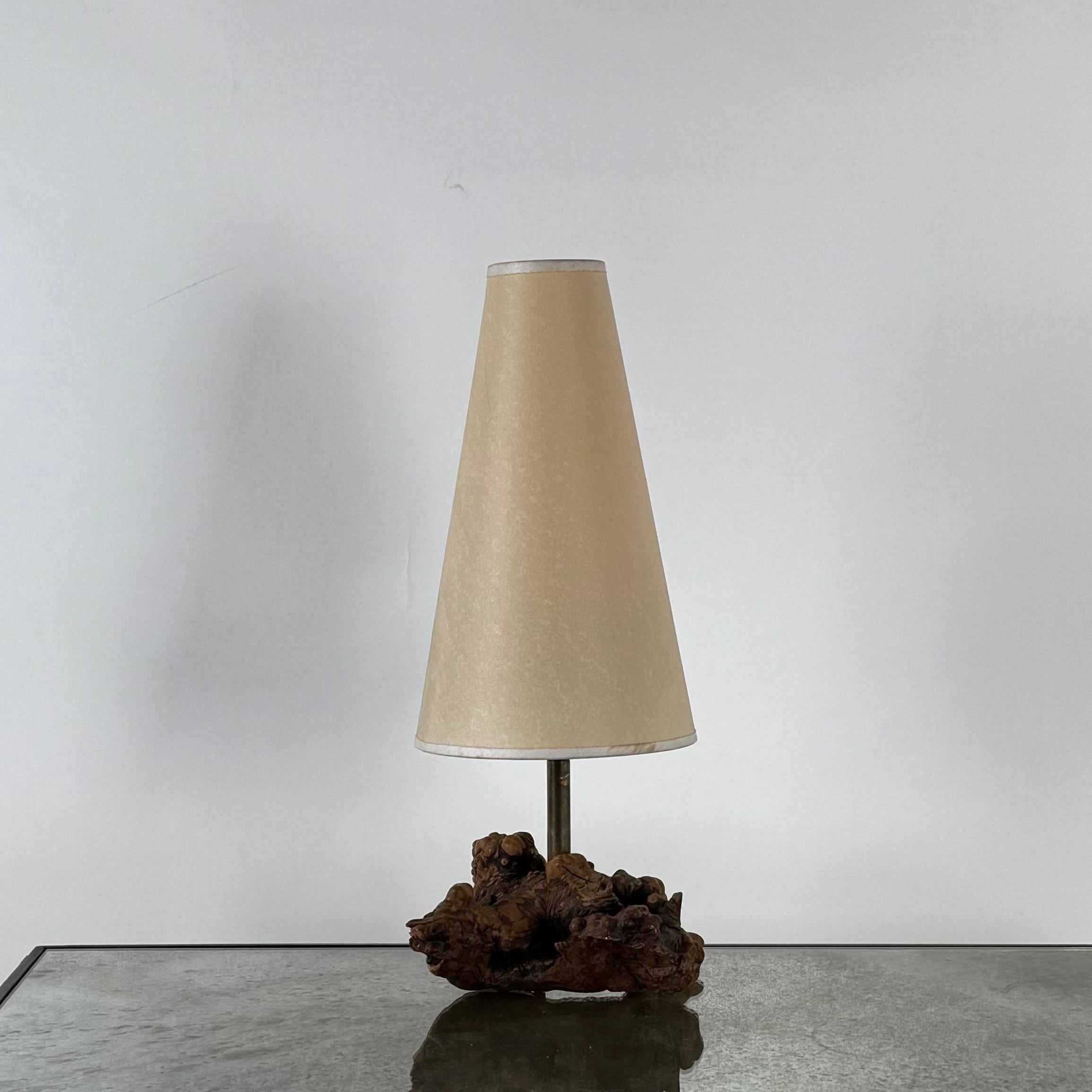 Small burl wood desk lamp with custom cream parchment paper shade.
Perfect for a mid-century desk.
Chic and understated.